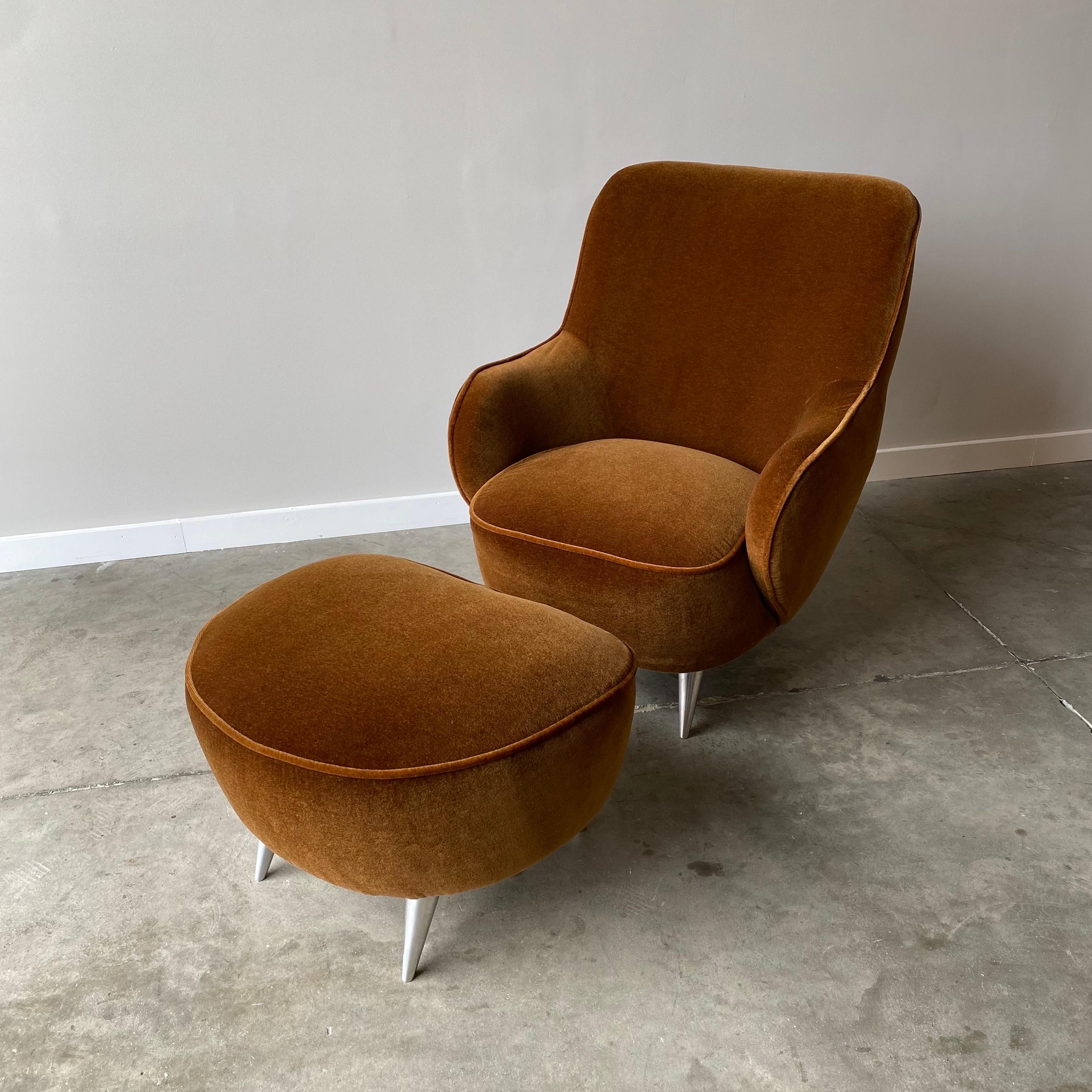 A striking set from the Vladimir Kagan New York Collection.  
Newly upholstered in a stunning brown mohair with brassy undertones, brushed aluminum legs.


Chair measures 36