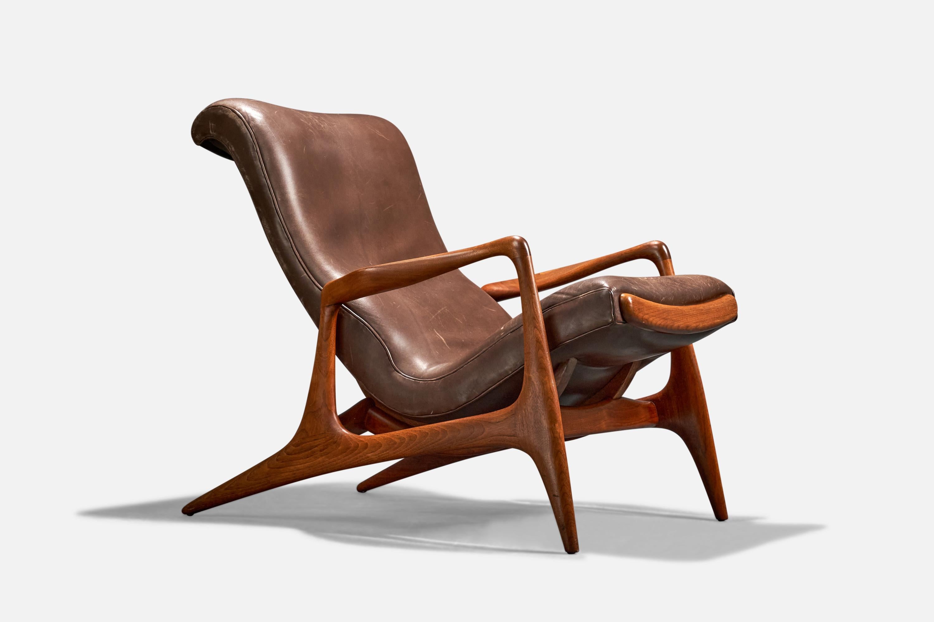 An adjustable, leather and walnut lounge chair designed by Vladimir Kagan and produced by Kagan-Dreyfuss, Inc, USA, 1956.

Dimensions of retractable foot rest at maximum extended position (inches) : 60.5