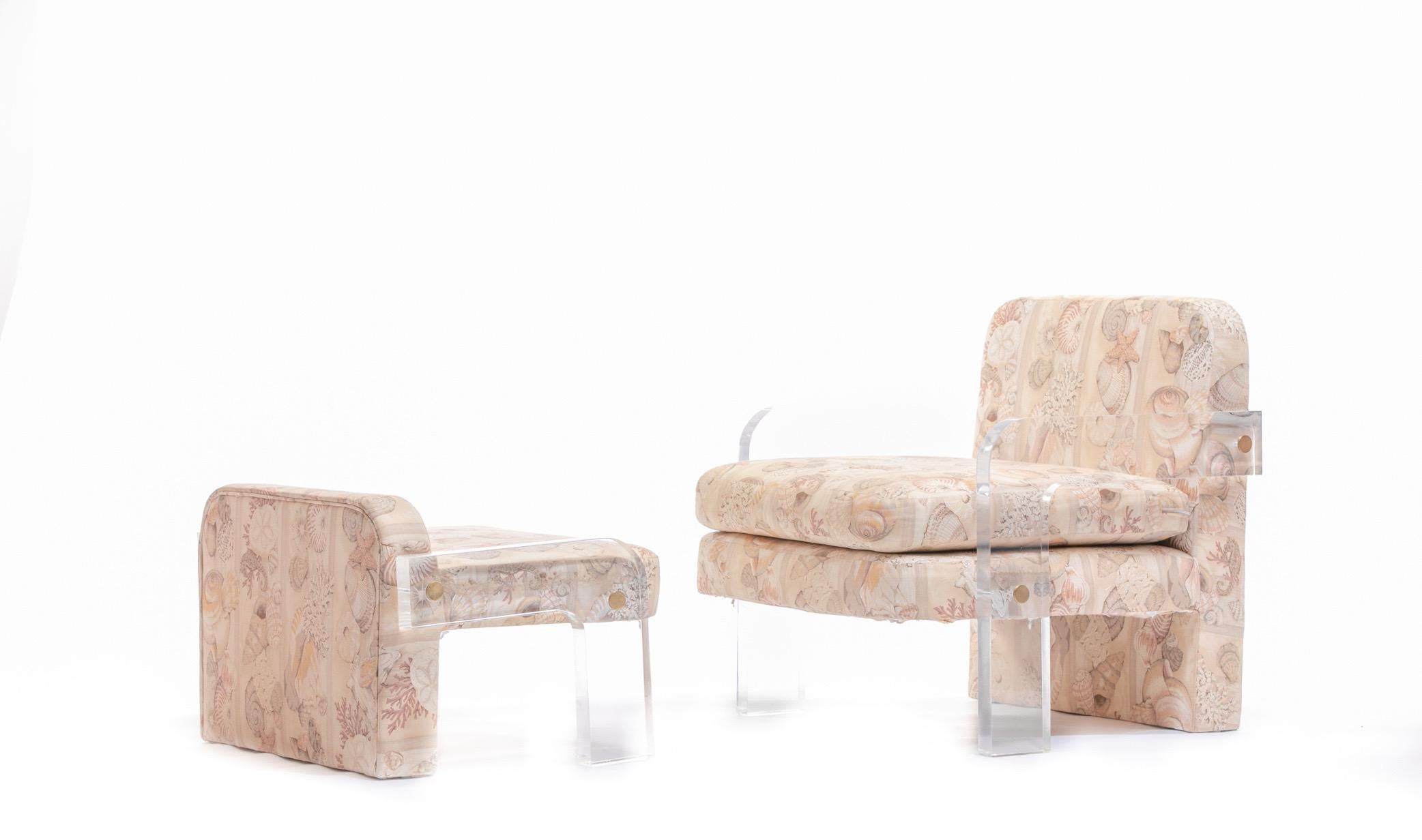 Iconic Vladimir Kagan sculptural Lucite lounge chair and ottoman, circa 1970s. Thick clear sculpted Lucite arms support the modern frame of Vladimir Kagan’s modern take on a duchess brisée. The ottoman can be used on its own as a stool or with the