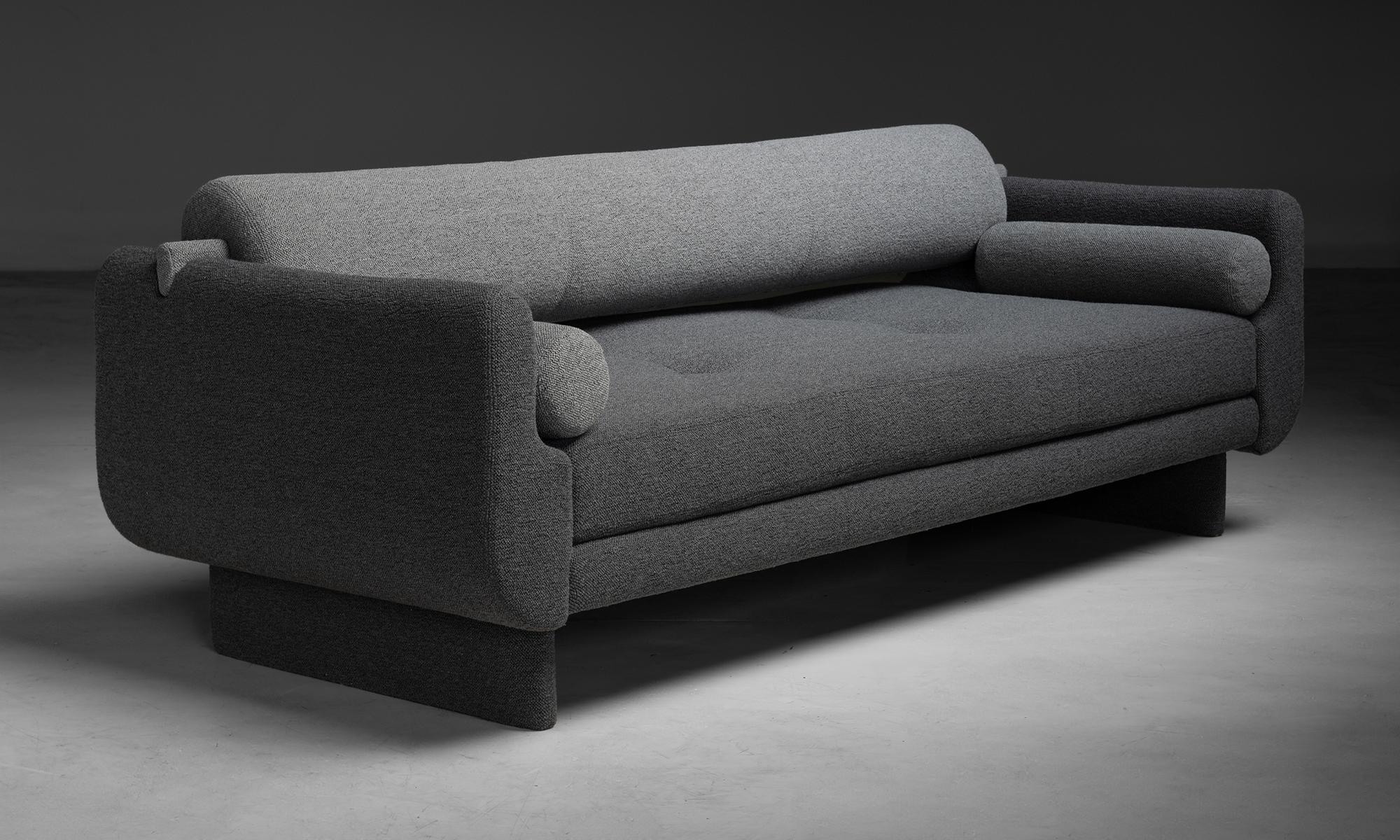 Vladimir Kagan Matinee Sofa / Daybed in Boucle
America, 2002
Iconic Matinee Sofa/Daybed by Vladimir Kagan. Removable back bolster to transform into a daybed, with 2 tubular pillows.
88”L x 36”d x 30.5”h x 18”seat