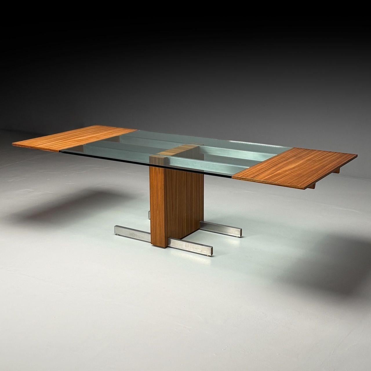 Vladimir Kagan, table de salle à manger moderne du milieu du siècle, bois zébré et verre, États-Unis, 1967

La table à manger extensible modèle 6705, conçue par Vladimir Kagan pour Vladimir Kagan Designs, Inc. en 1967, est un exemple étonnant du