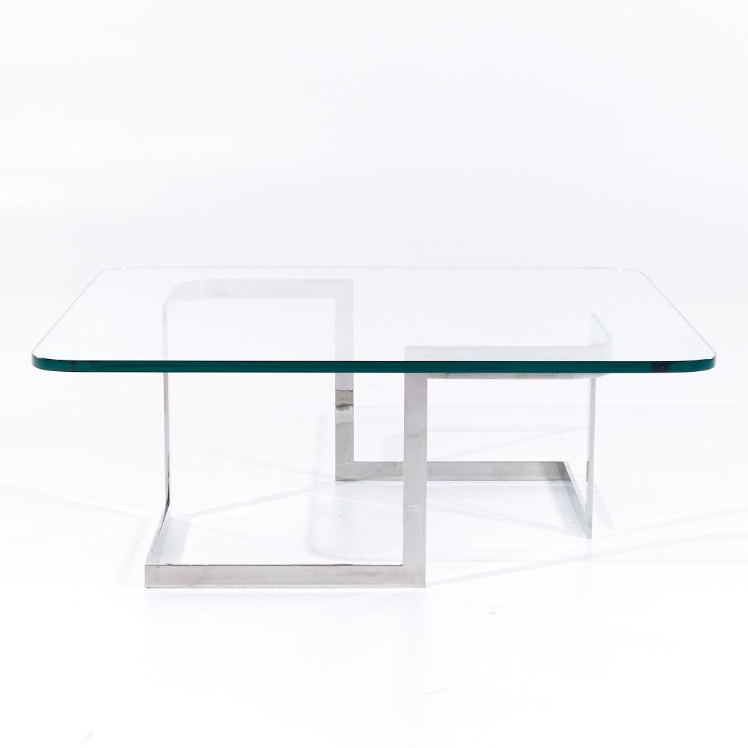 Table basse infinie Vladimir Kagan du milieu du siècle dernier en acier et verre

Cette table basse mesure : 42 de large x 42 de profond x 16 de haut

Tous les meubles peuvent être achetés dans ce que nous appelons un état vintage restauré. Cela