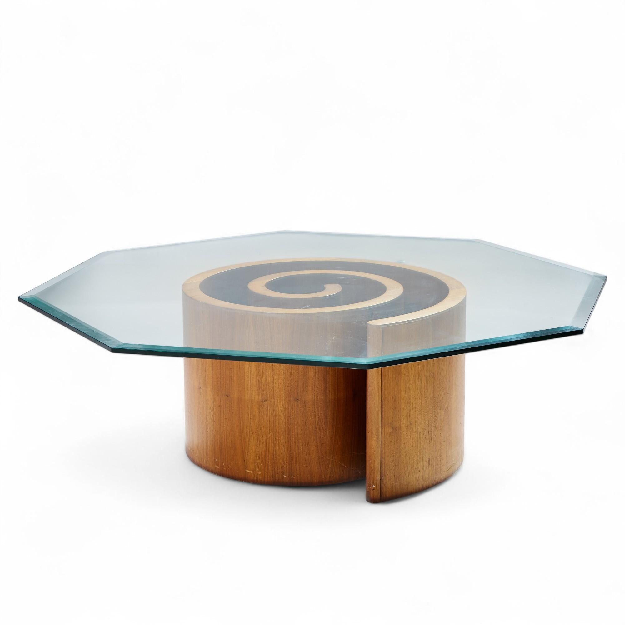 Vladimir Kagan Mid Century Walnut Snail Coffee Table

This coffee table measures: 46 wide x 46 deep x 14.75 inches high

Great Vintage Condition - Minor Stain Wear to the Table Base. Glass is in Good Shape with Minor Scratches. Overall Great