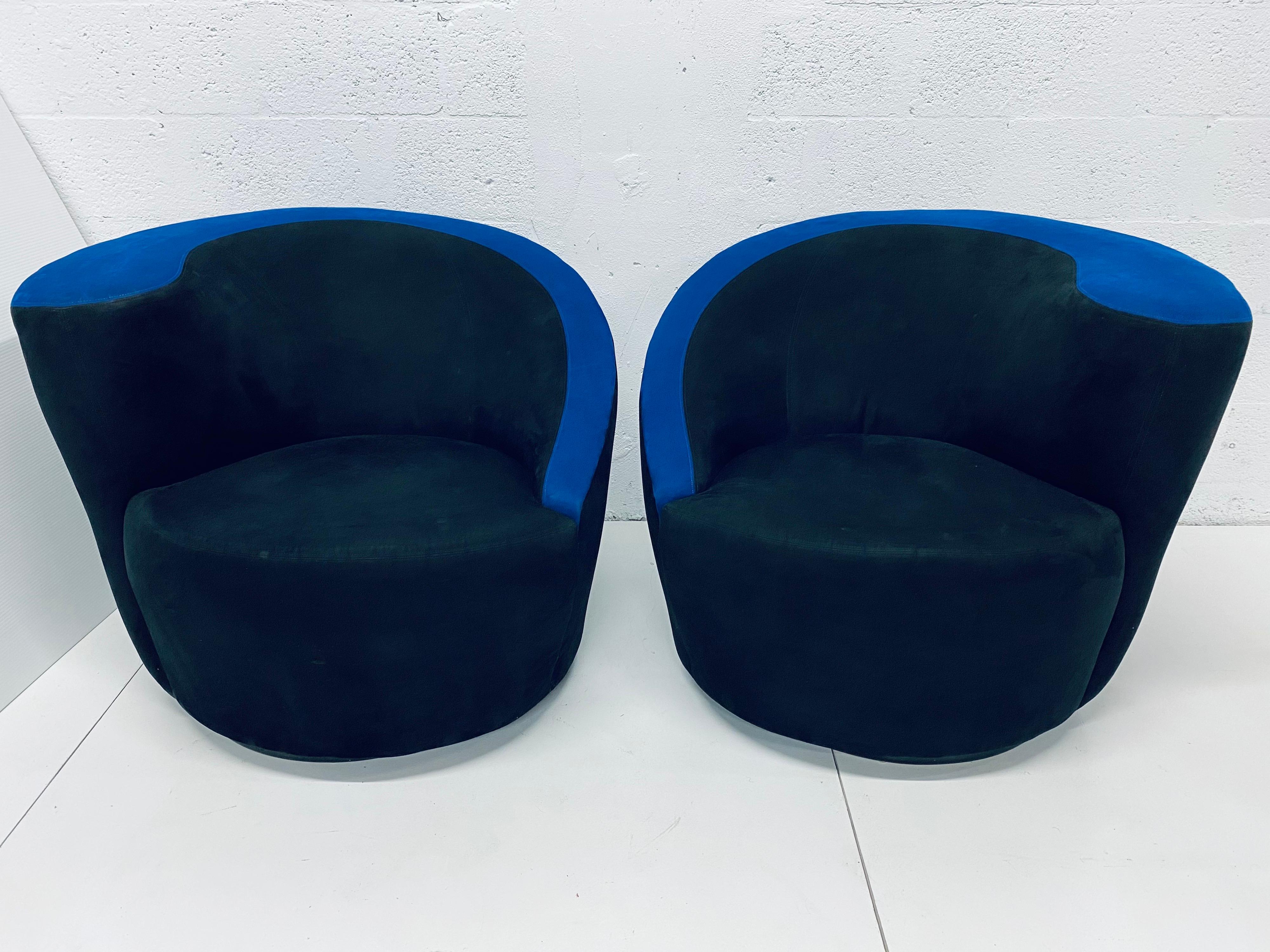 Pair of vintage black and blue ultra suede swivel club chairs by Vladimir Kagan for Directional. Swivel bases are wrapped in ultra suede and maintains Directional labels. Use with original fabric or have reupholstered.