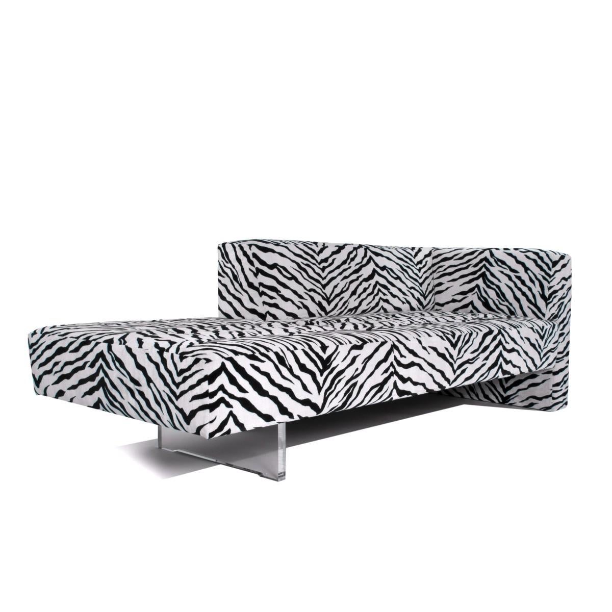 The Omnibus chaise lounge by Vladimir Kagan in COM / COL. USA, circa 1980. Features upholstered seat with signature Lucite base. Price includes Labor / custom reupholstery in Client's Own Material (COM) or Client's Own Leather (COL). Please allow 4