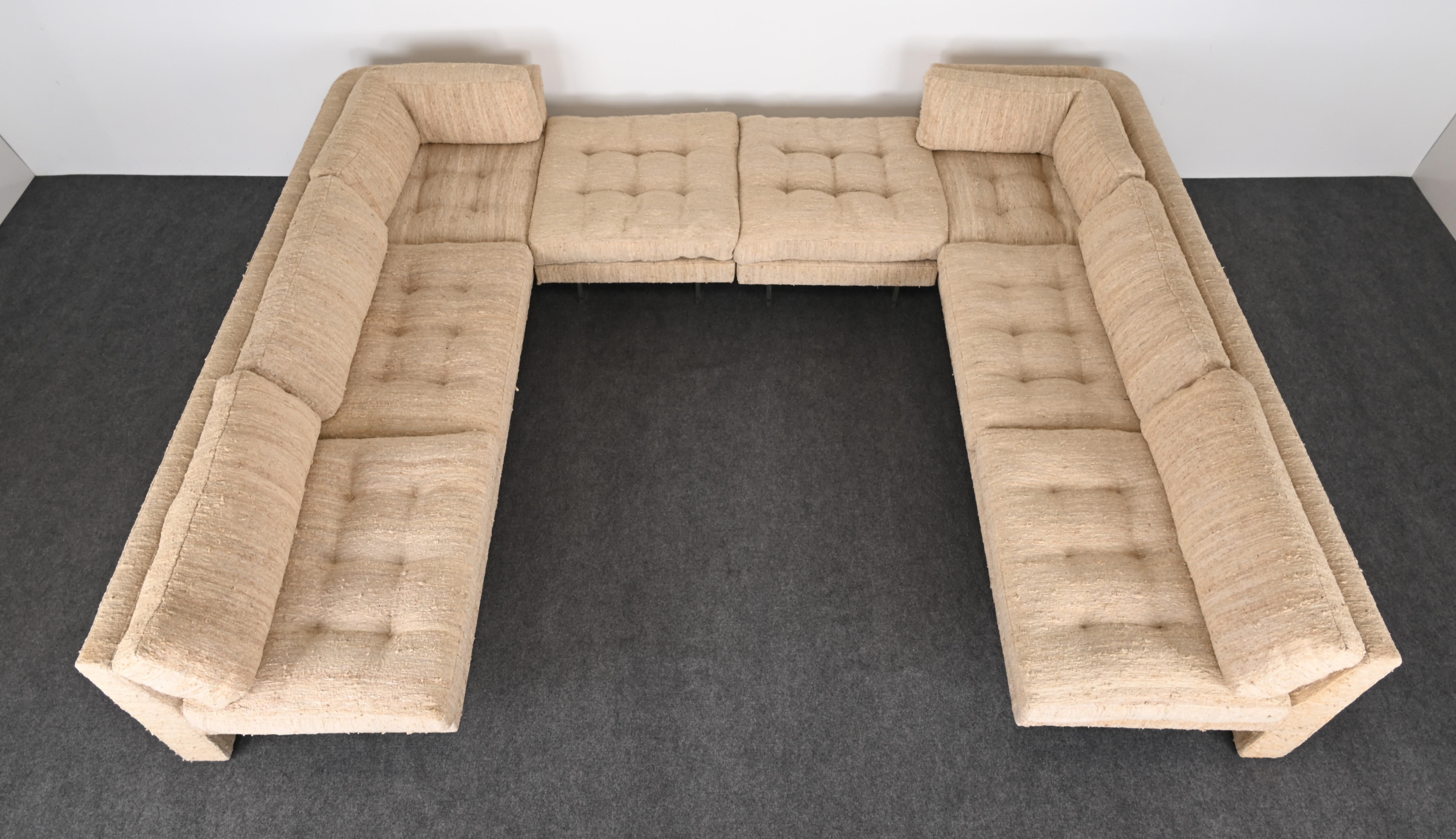 A monumental two-piece sectional Omnibus I sofa with two ottmans by Vladimir Kagan, 1970s. This modular sofa would look great in any Mid-Century Modern or Contemporary home. The scale is wonderful, however, new upholstery is recommended. The lucite