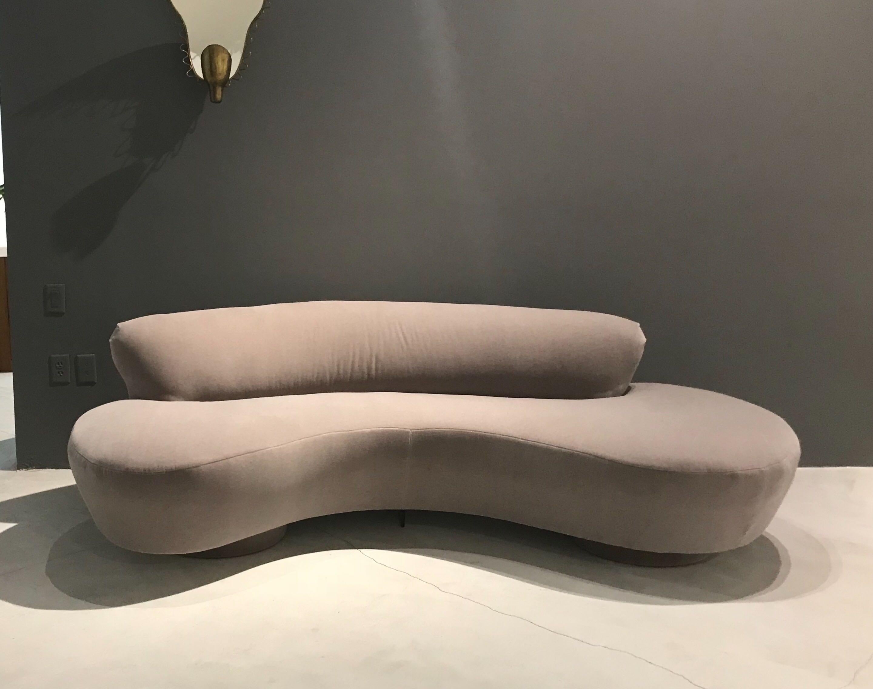 A curved serpentine sofa by Vladimir Kagan model 