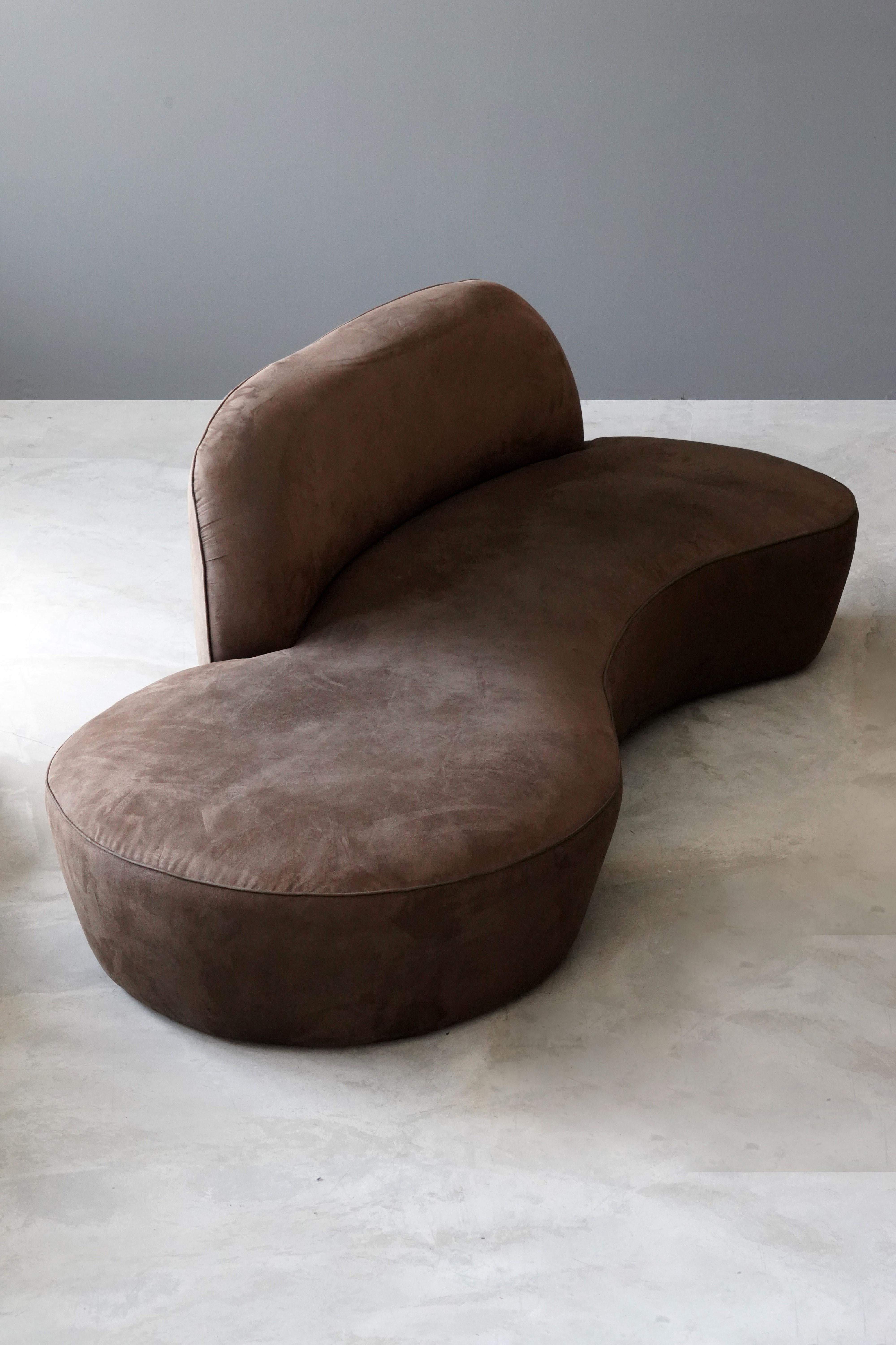 A Vladimir Kagan sofa in it's original brown velvet with a form referencing the early organic design movement. Comfortable backrest. Rare version executed in limited numbers for room and board. Replacing reupholstery is advised upon