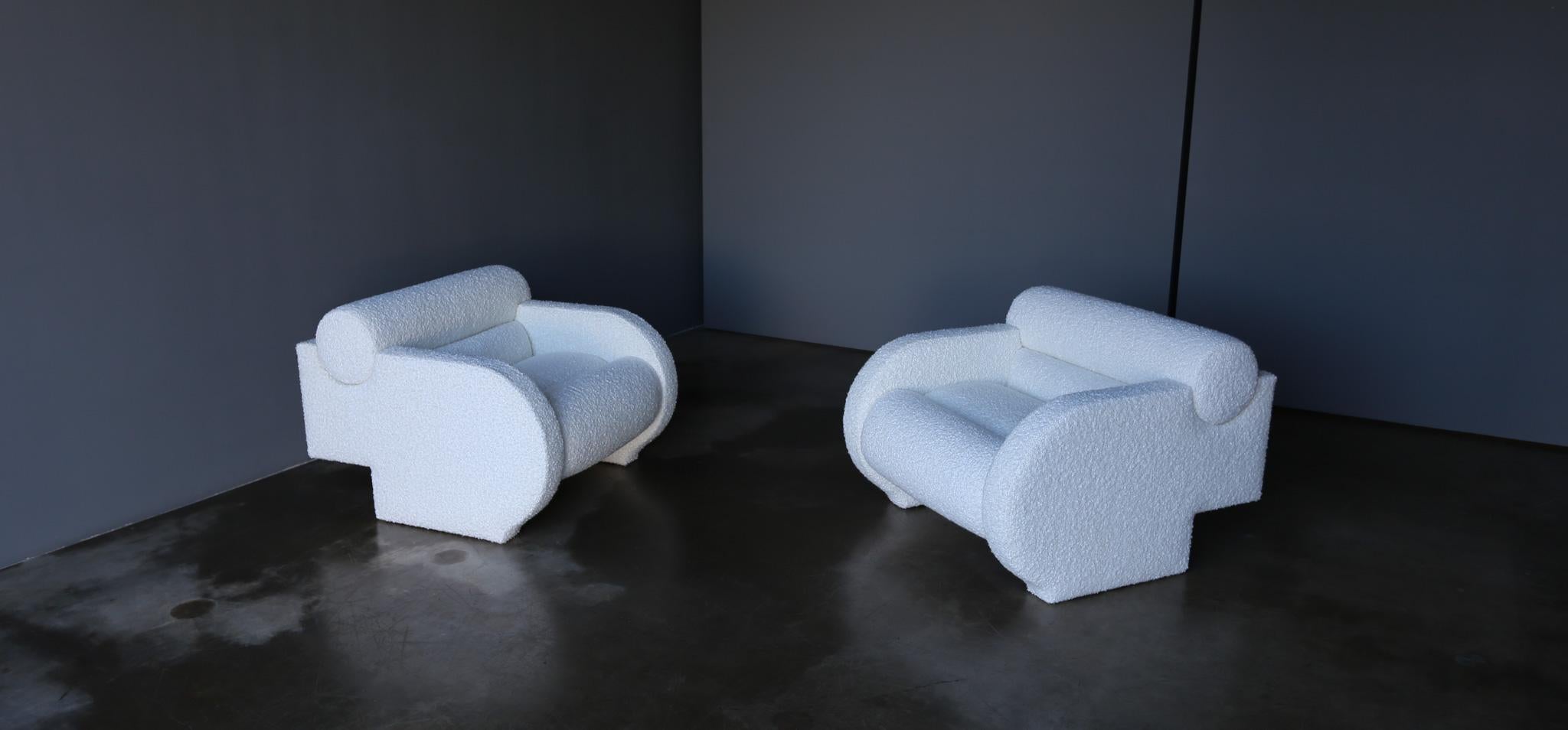 Vladimir Kagan Postmodern Roll-Back Lounge Chairs, United States, 1985.  This pair has been expertly restored.  

Literature: Vladimir Kagan: A Lifetime of Avant-Garde Design, Kagan, pg. 147
