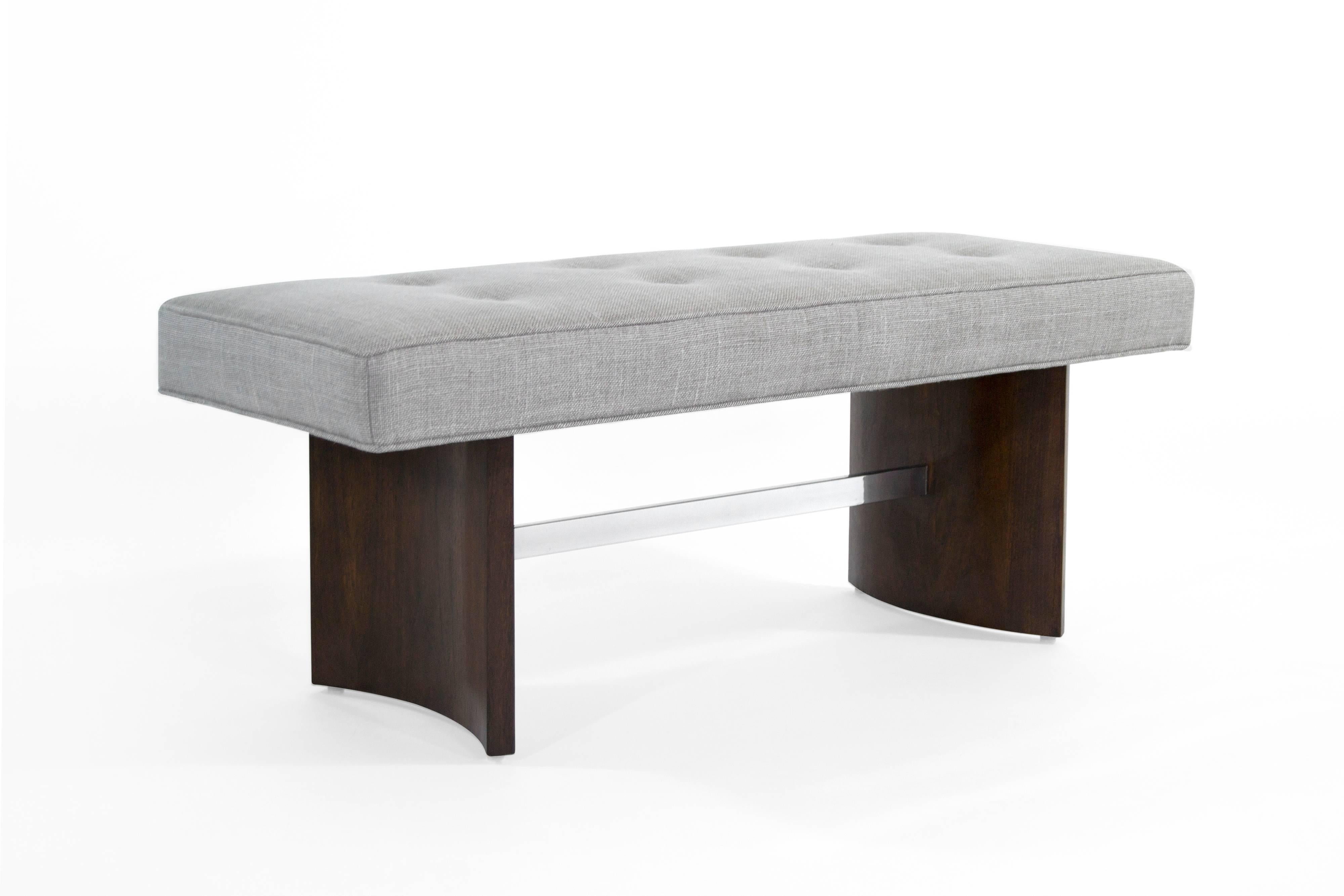 Radius bench designed by Vladimir Kagan for Selig, circa 1950s. Walnut base fully restored, nickel stretcher in excellent condition. Newly upholstered in grey linen.