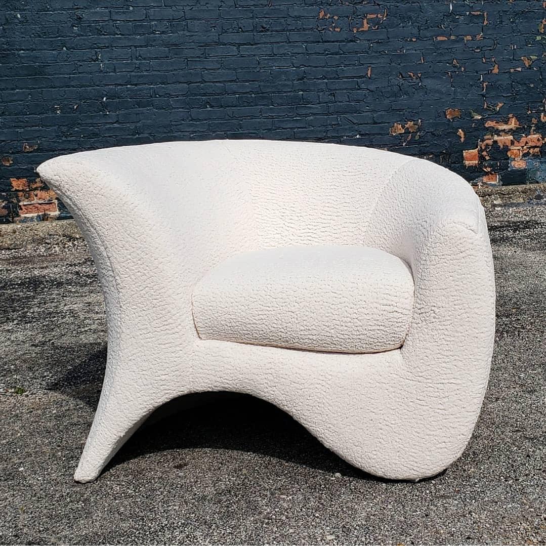 Vladimir Kagan sculptural lounge club chair newly reupholstered in a textured white fabric.
