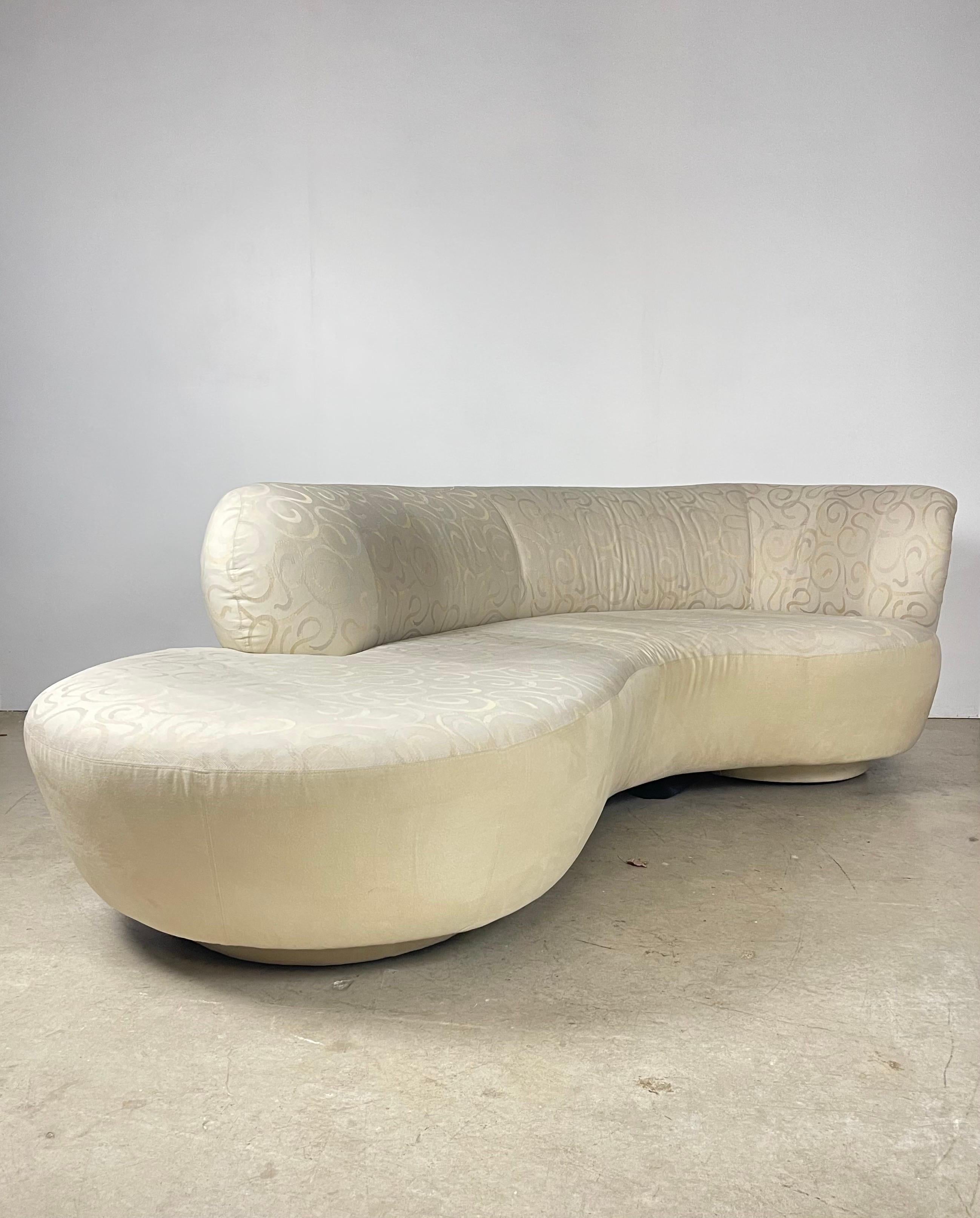 Serpentine sofa design often attributed to the late Vladimir Kagan. No manufacturers tags. Original upholstery, shows wear. Recommended to be replaced. 