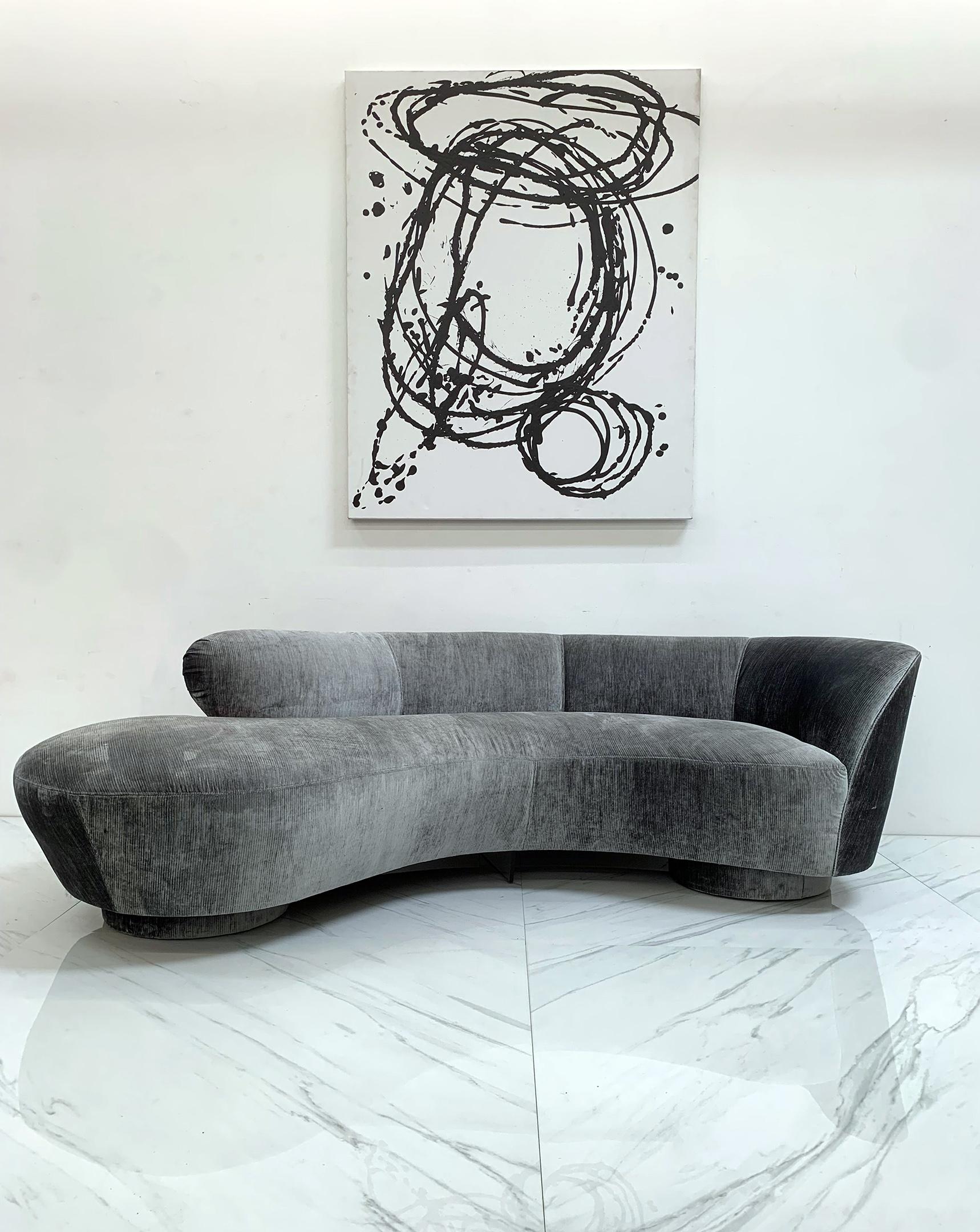 Designed by Vladimir Kagan in the early 1990's for Directional Furniture this Vladimir Kagan right arm serpentine cloud sofa is just gorgeous. Clad in a fine slate gray cotton chenille, this sofa is equal parts comfort, beauty and art. 

Vladimir