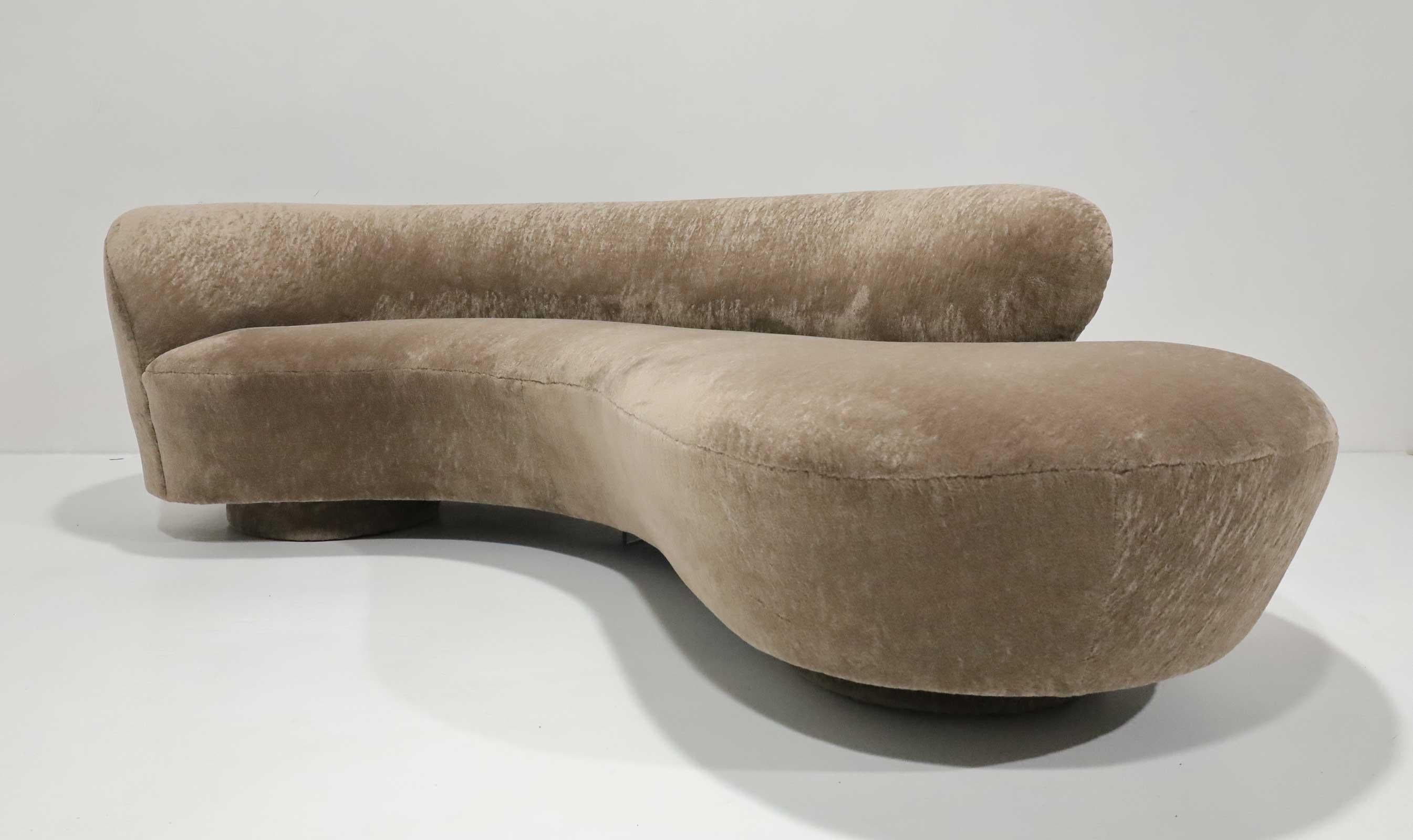Vladimir Kagan serpentine sofa by Directional. Newly upholstered in a beautiful fabric by Holly Hunt. Smokey is a faux fur that feels super soft and look luscious. 
