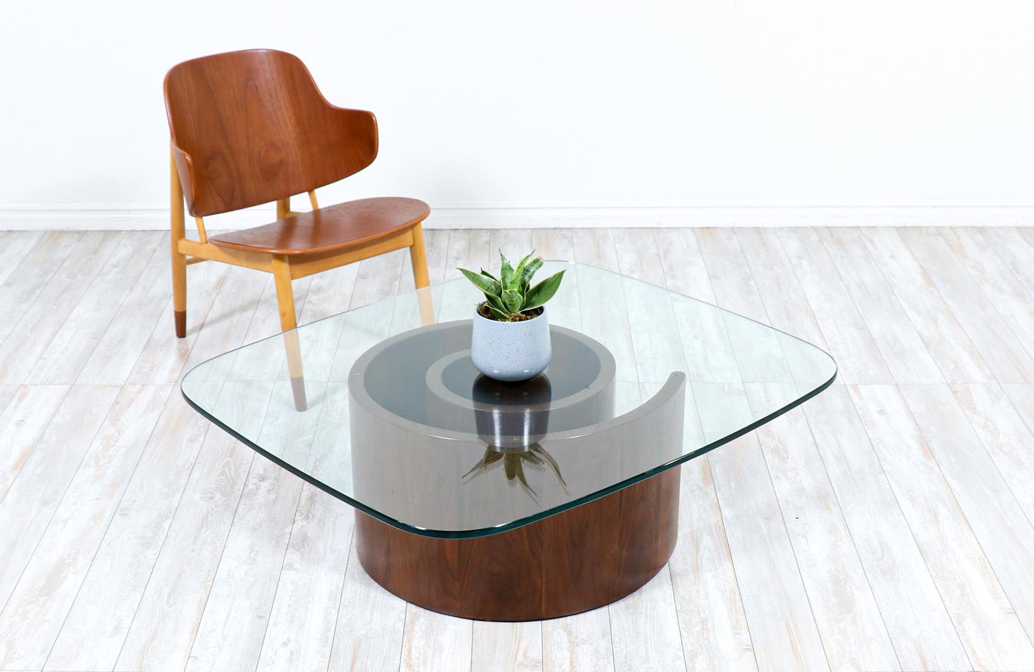 Vladimir Kagan “Snail” coffee table with glass top for Selig.