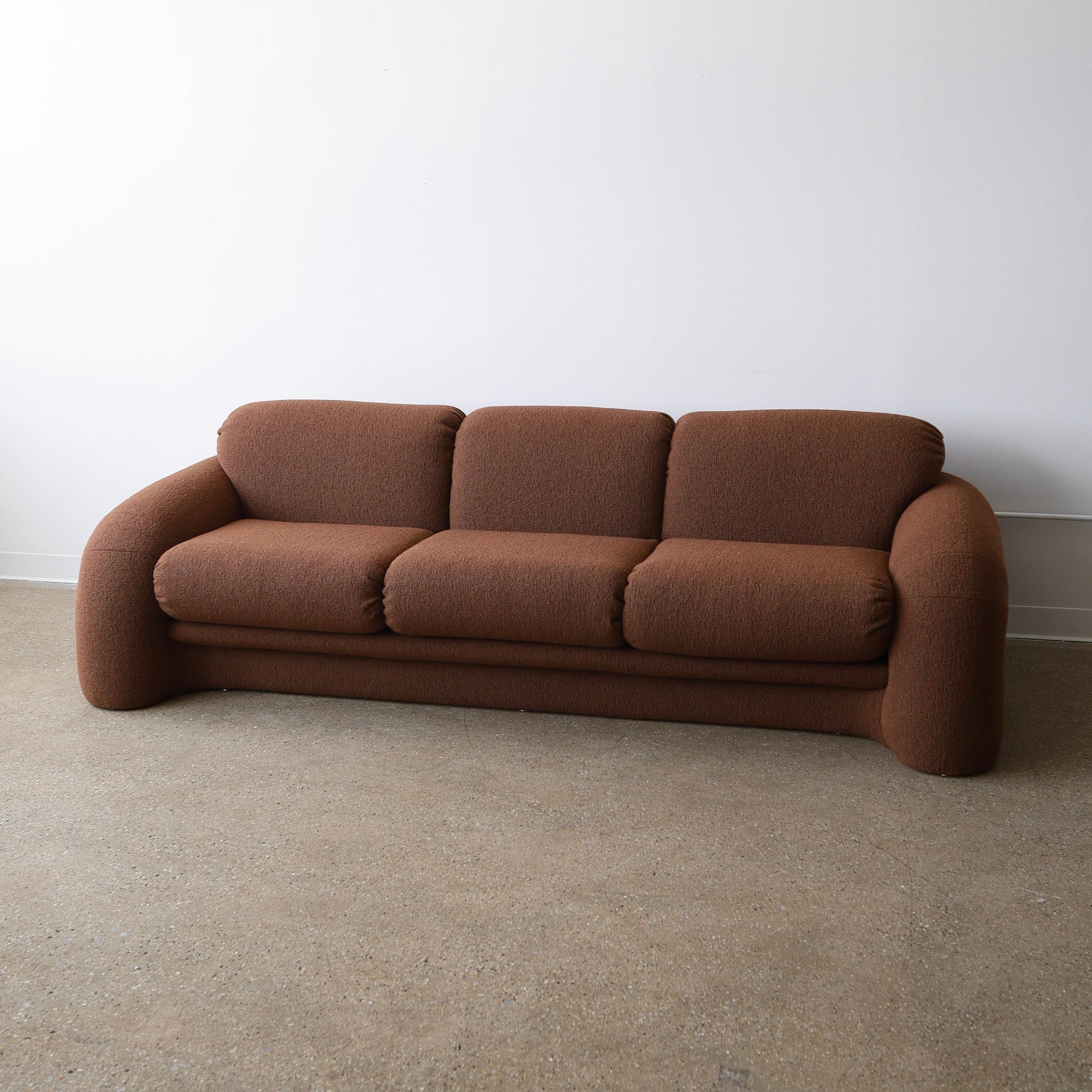 c. 1980s in excellent, restored condition. It has been fully reupholstered in Maharam “Hearth”

