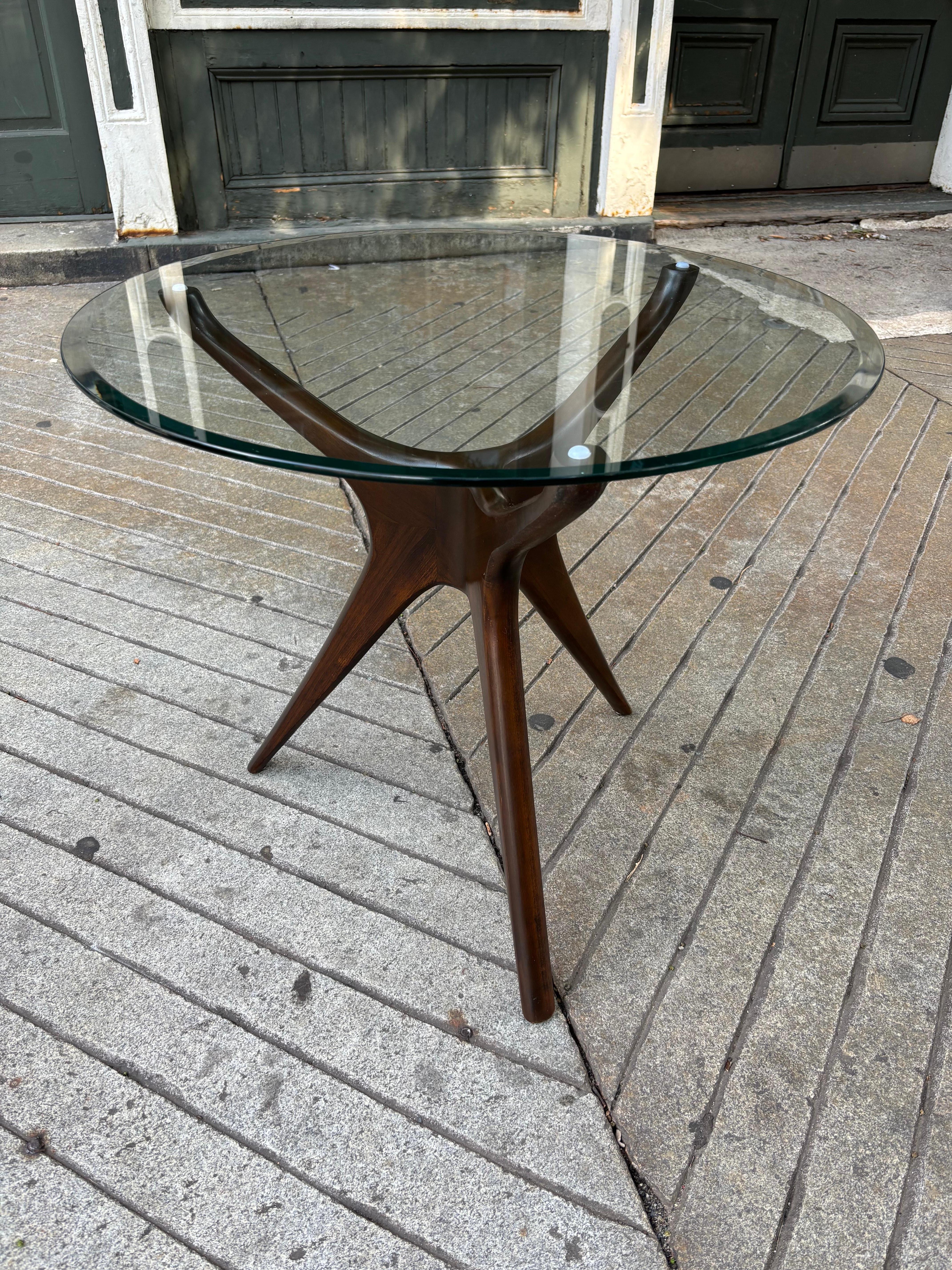 Vladimir Kagan Style 3 legged glass and Walnut Side Table In Good Condition In Philadelphia, PA