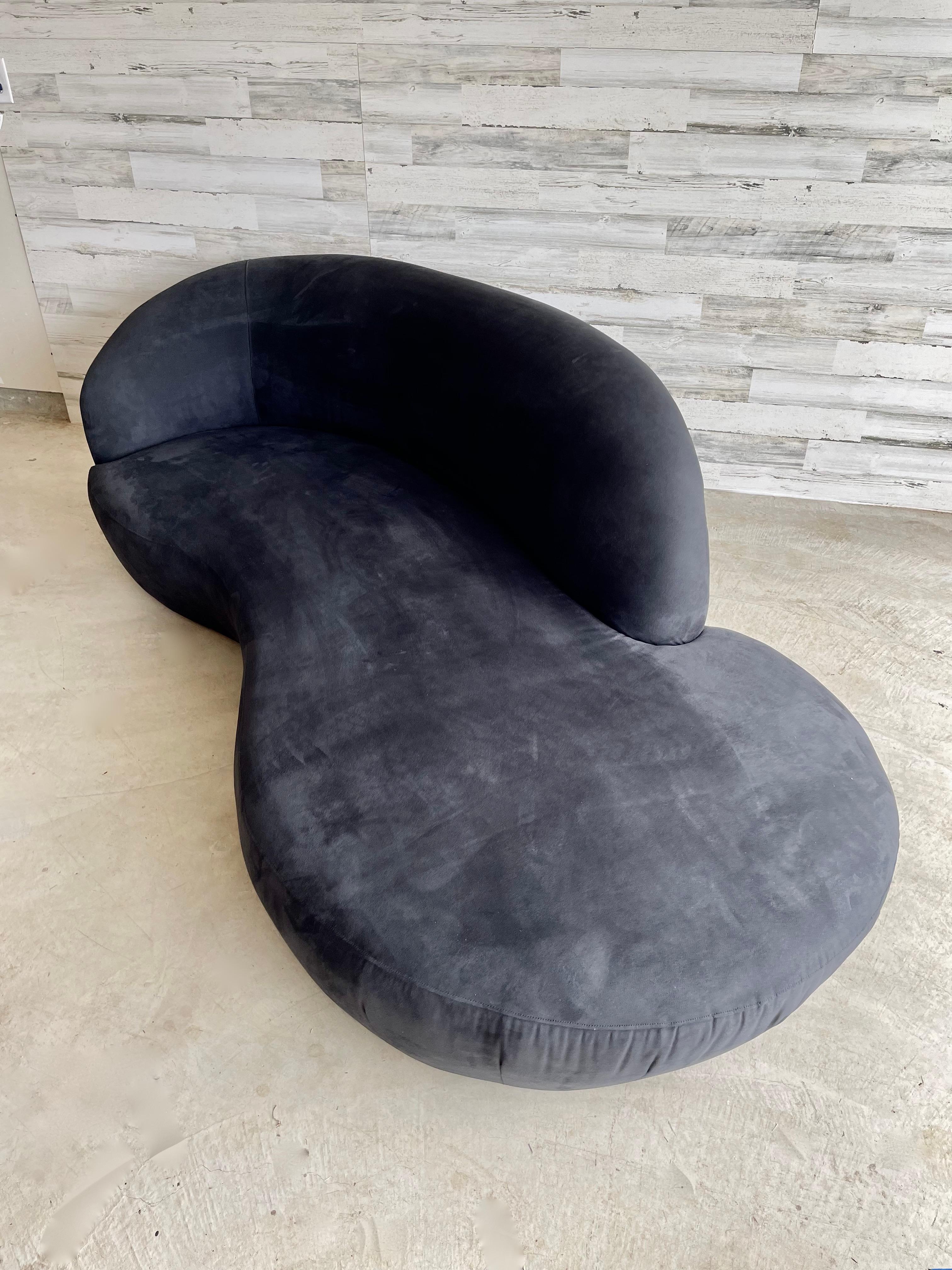 Cloud sofa in black microfiber fabric.