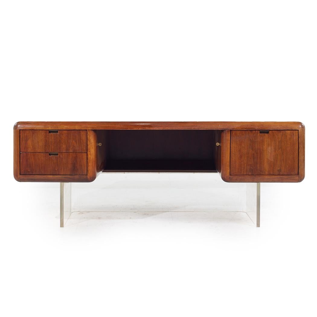 Vladimir Kagan Style Gianni Walnut and Lucite Executive Desk

This desk measures: 77.5 wide x 38 deep x 29.25 high, with a chair clearance of 27 inches

All pieces of furniture can be had in what we call restored vintage condition. That means the