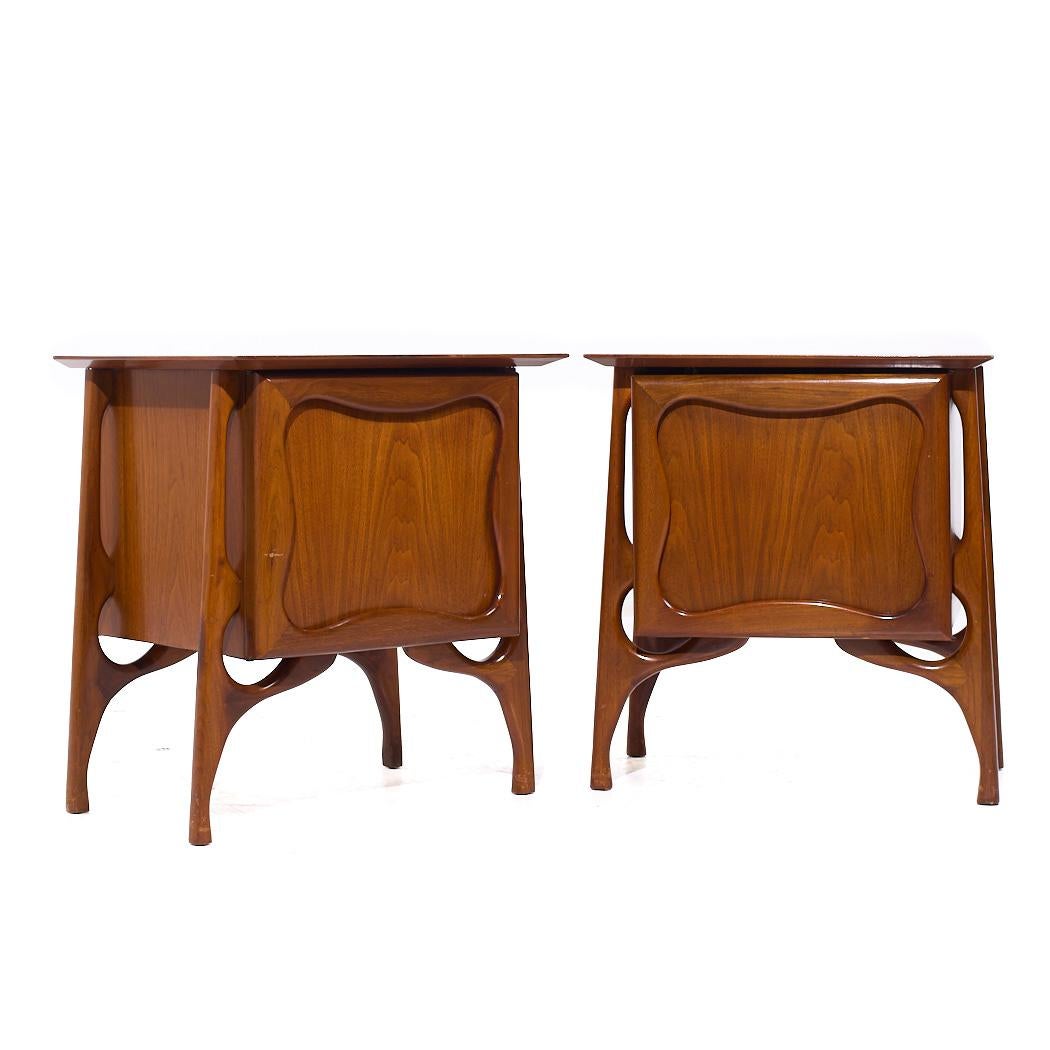 Mid Century Sculptural Walnut Nightstands - Pair

Each nightstand measures: 23 wide x 17.75 deep x 25.5 inches high

All pieces of furniture can be had in what we call restored vintage condition. That means the piece is restored upon purchase so