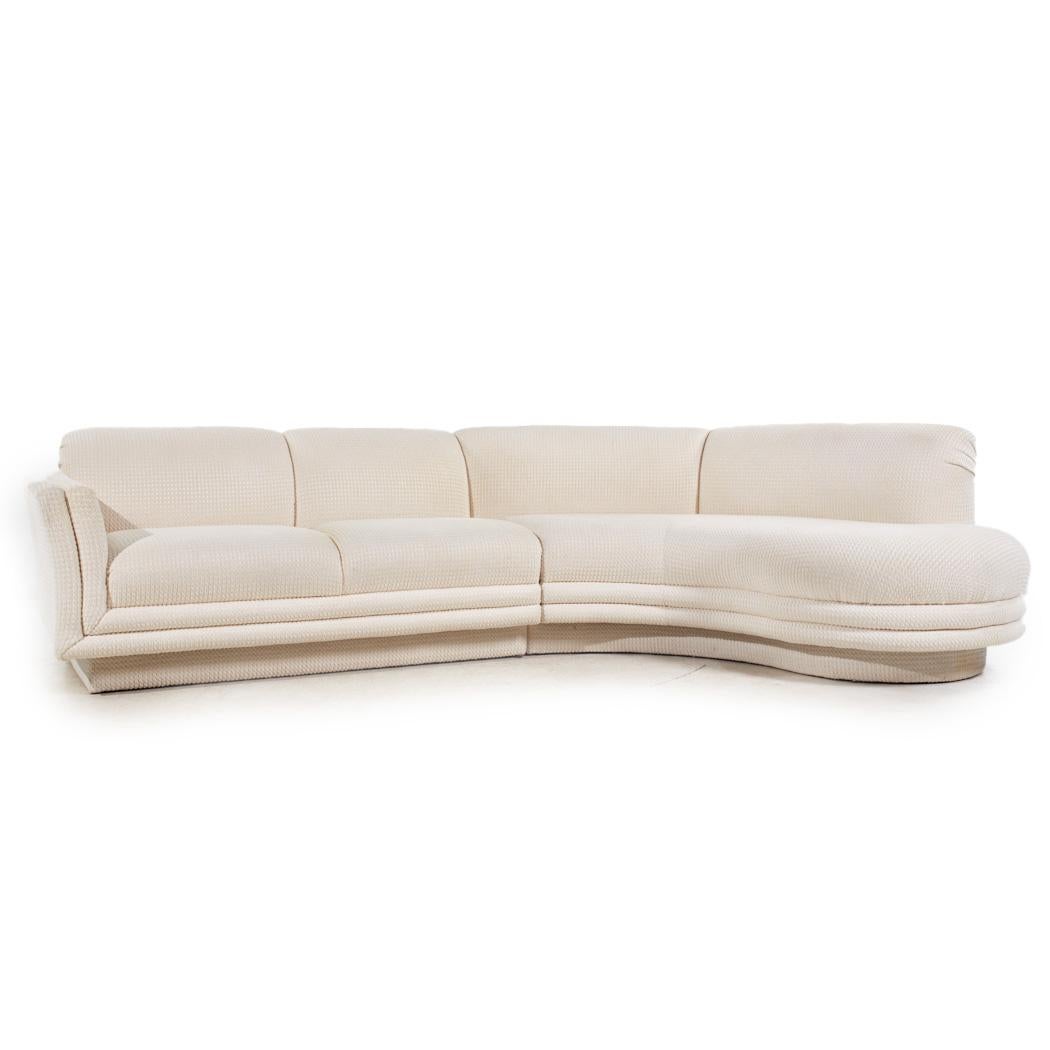 Vladimir Kagan Style Weiman Mid Century Curved Sectional Sofa

This sofa measures: 114 wide x 34 deep x 30 inches high, with a seat height of 18 and arm height of 24 inches

All pieces of furniture can be had in what we call restored vintage