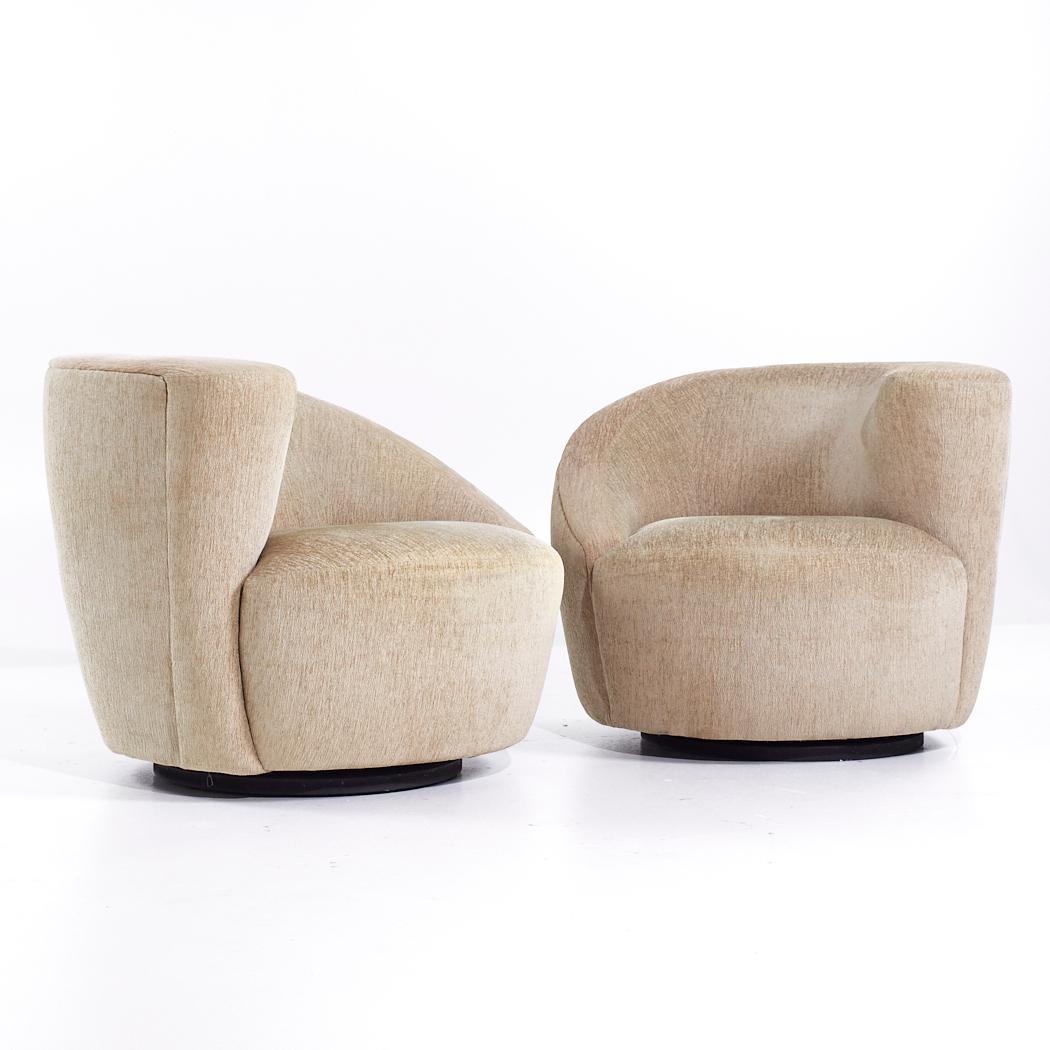 Vladimir Kagan Style Weiman Nautilus Mid Century Chairs - Pair

Each lounge chair measures: 36 wide x 36 deep x 29.75 high, with a seat height of 17 and arm height/chair clearance 29.75 inches

All pieces of furniture can be had in what we call