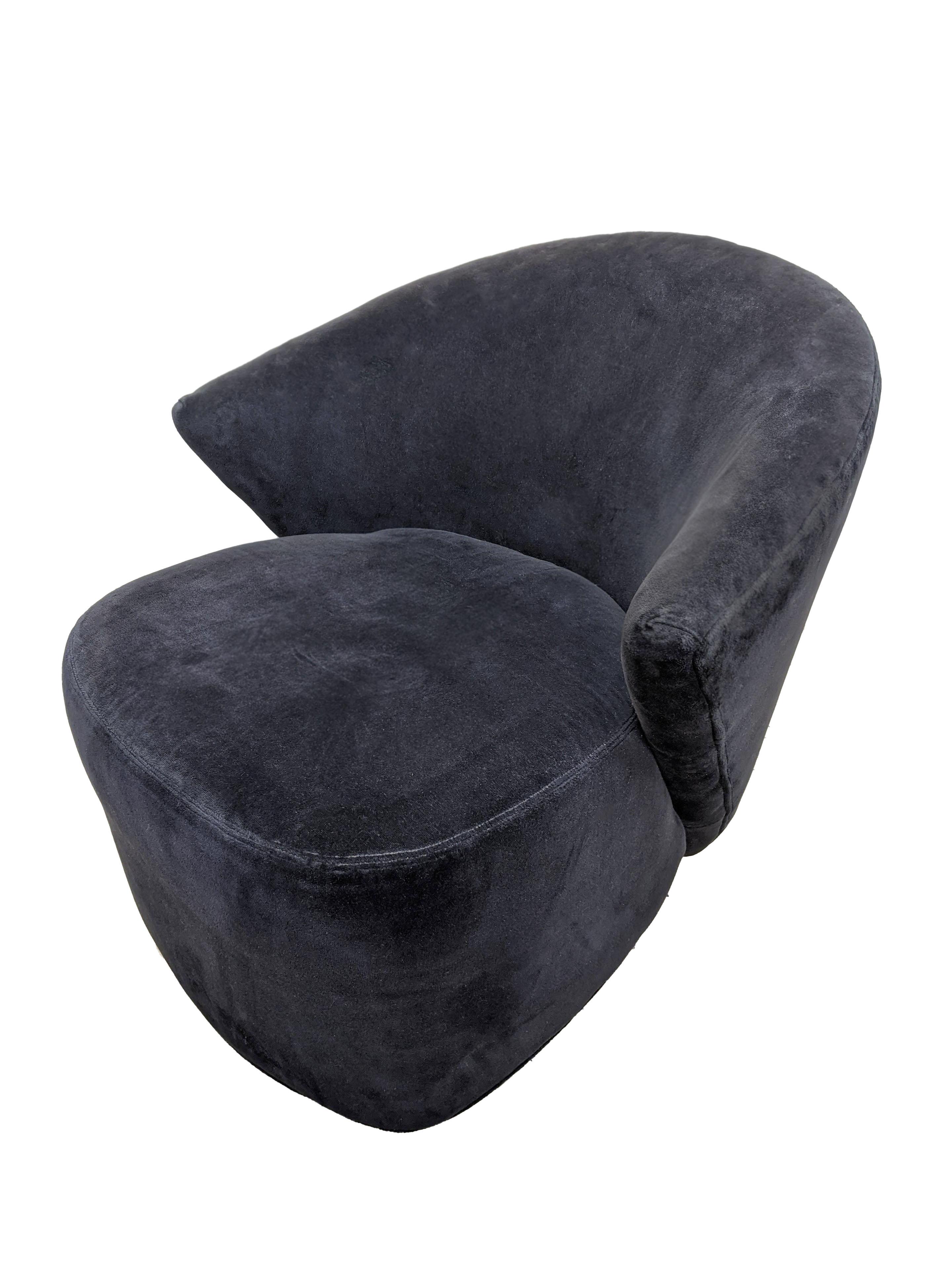 An absolutely stunning pair of swivel lounge chairs designed by Michael Wolk for Directional Furniture. These chairs are upholstered in the original dark charcoal velvet and are not only beautiful , but also incredibly comfortable. These Wolk lounge