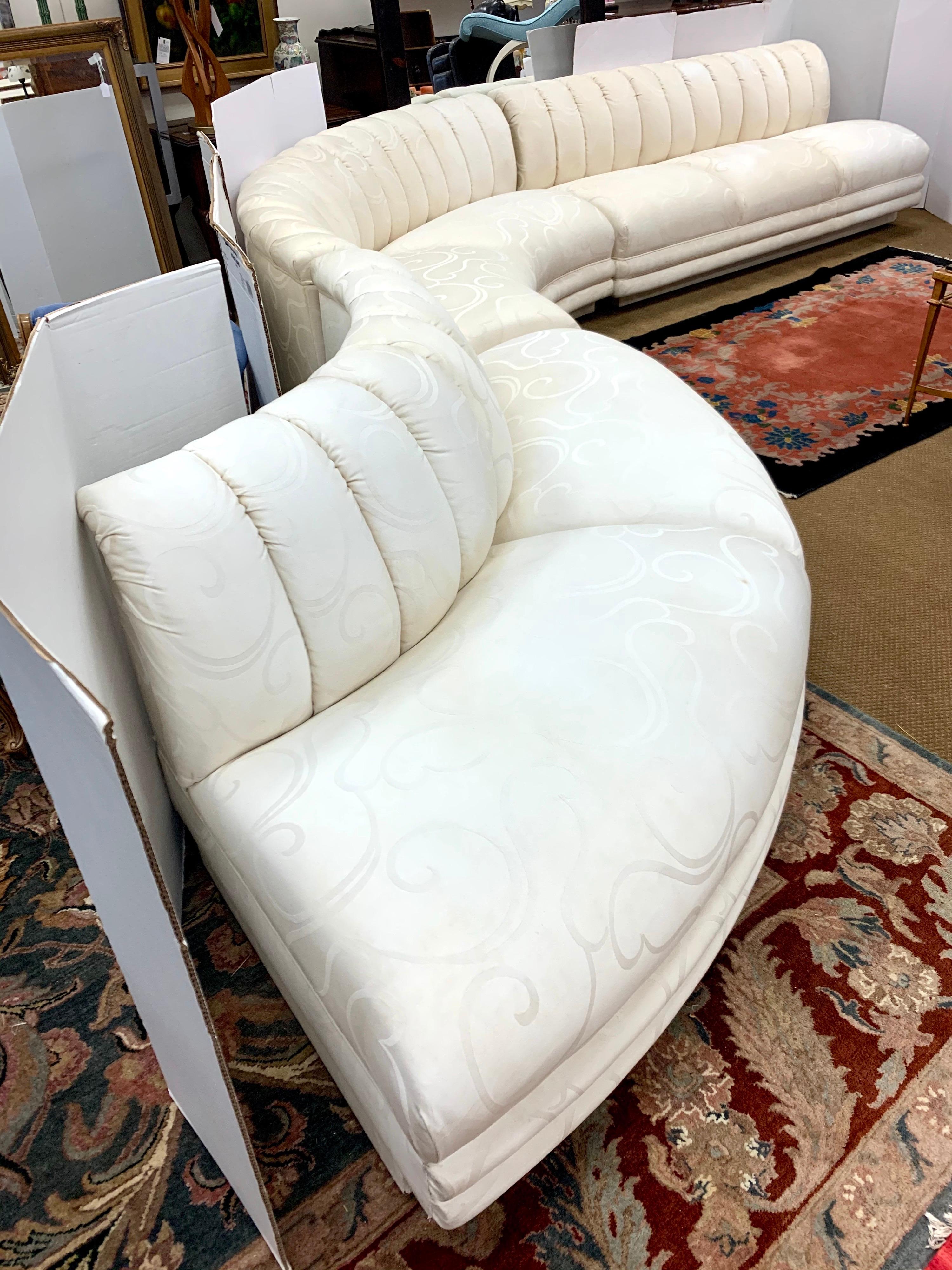 Coveted Kagan three piece modular sectional sofa with off white/cream colored fabric.
The three pieces measure just under fifteen feet wide, so you'll need a large room. These rare, 
serpentine sofas are hard to find, especially modular ones like