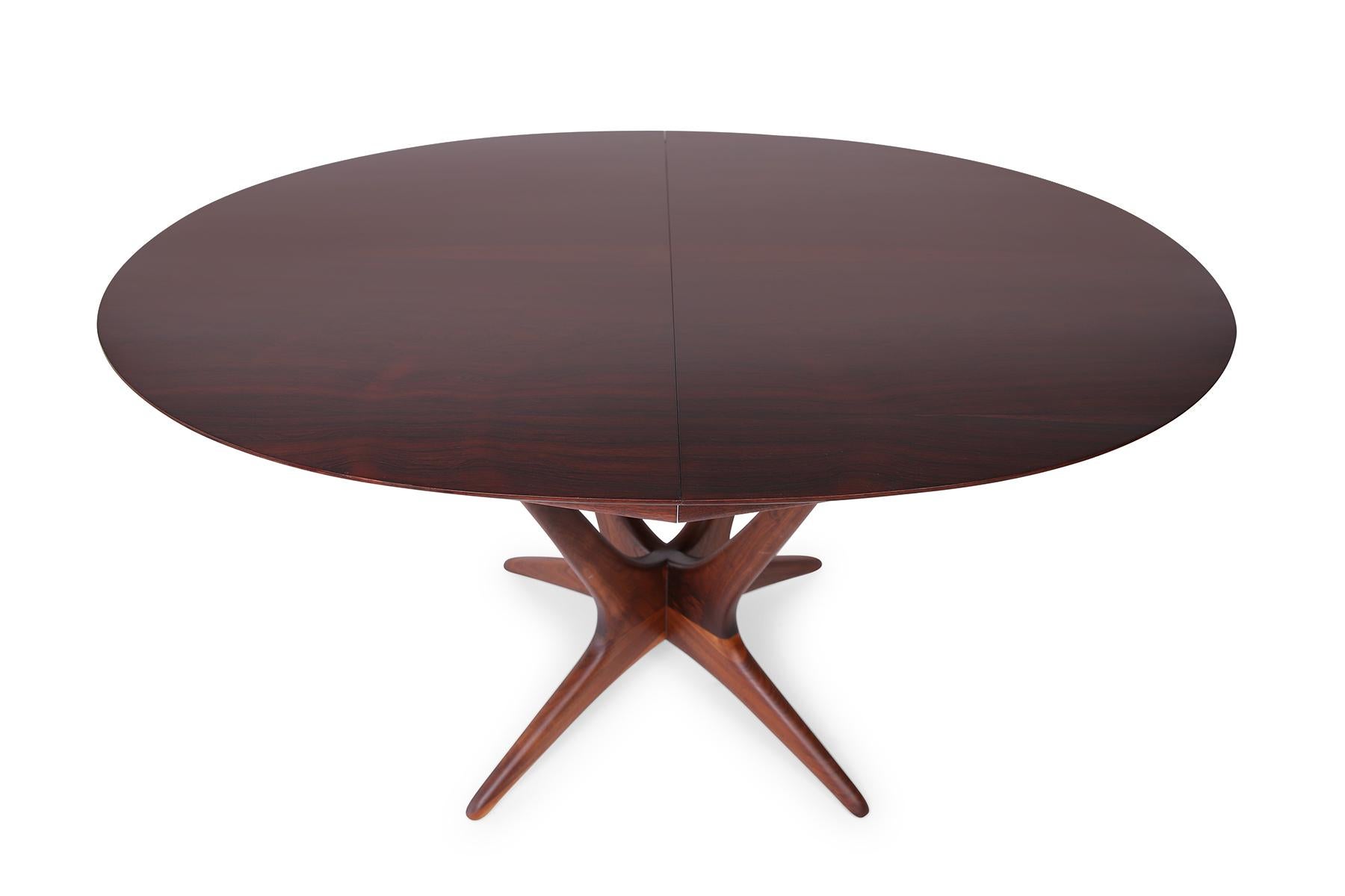 This seldom-seen Kagan studio made dining table features a central solid walnut base with distinctive sculptural branching structure based on his fascination with growth patterns of aboreal roots and branches. The table top is completely made from