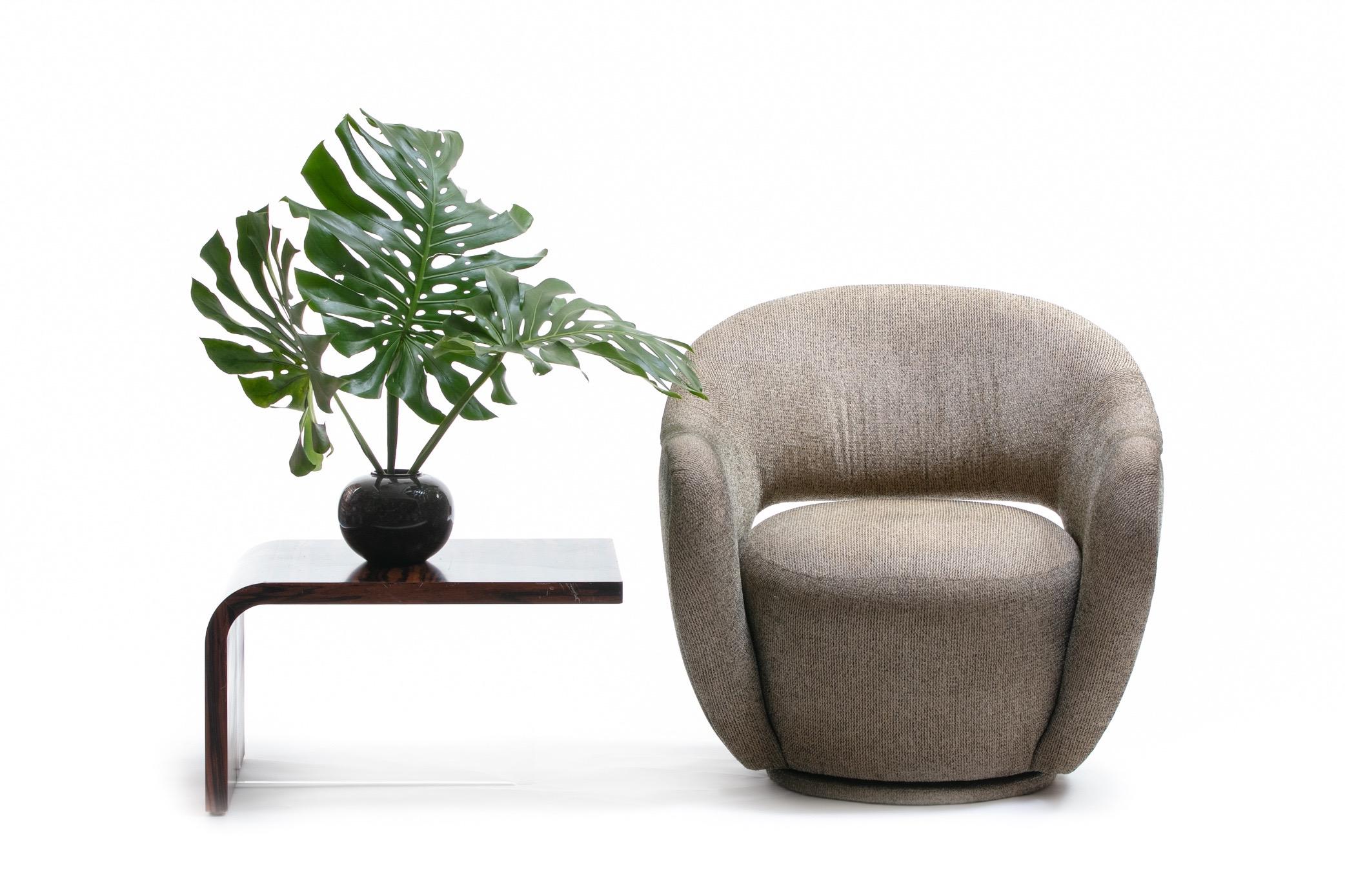 Organic sculptural Vladimir Kagan WYSIWYG (What You See Is What You Get) swivel chair for Directional. A generously scaled swivel chair that feels like a modern throne chair, it's actually more comfortable than you would ever surmise by simply