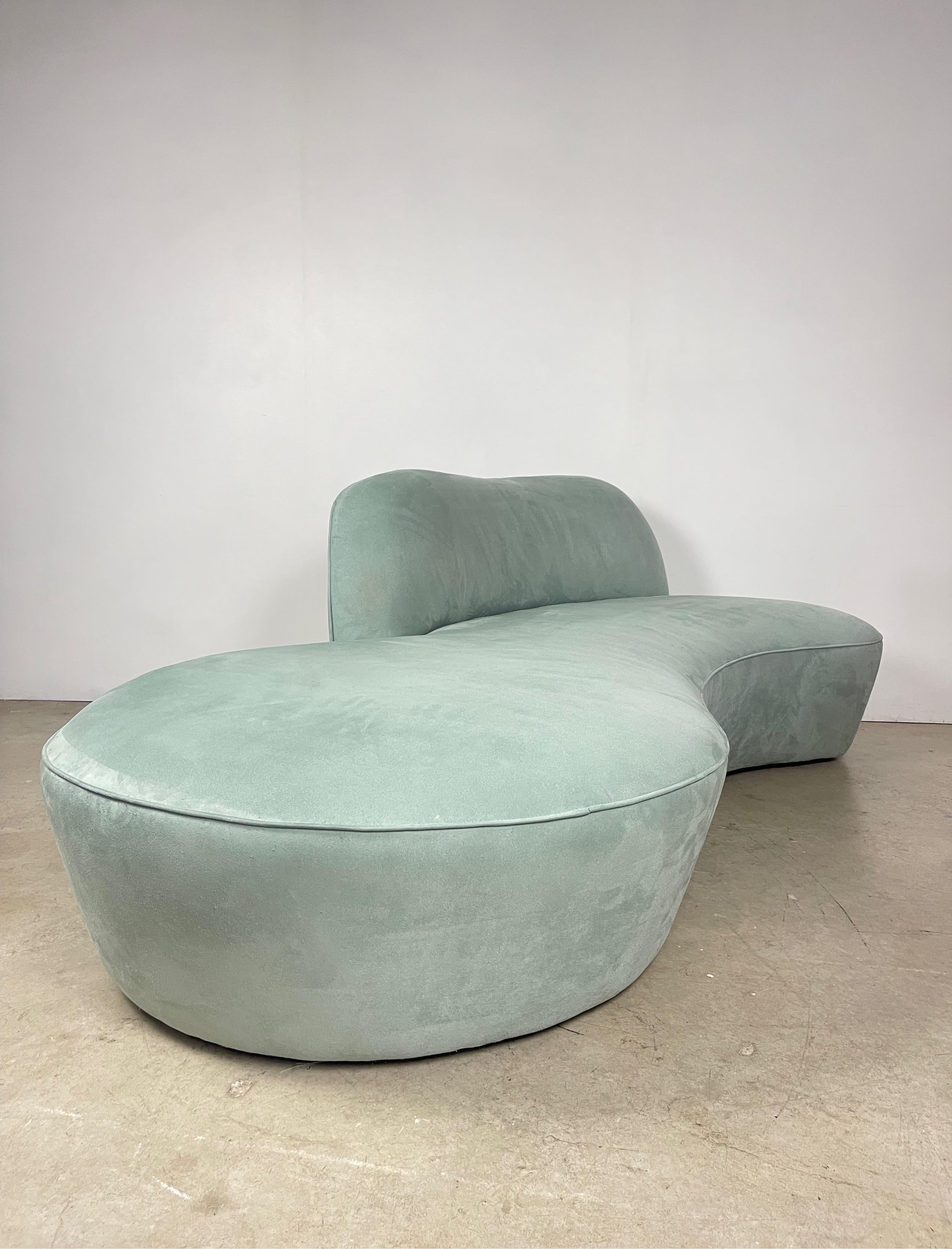 This is an authentic Vladimir Kagan Zoe sofa, one of his most iconic designs. The sofa features a curved shape that is both elegant and comfortable. Retains the original upholstery- recommended to be replaced as it shows wear and discoloration.