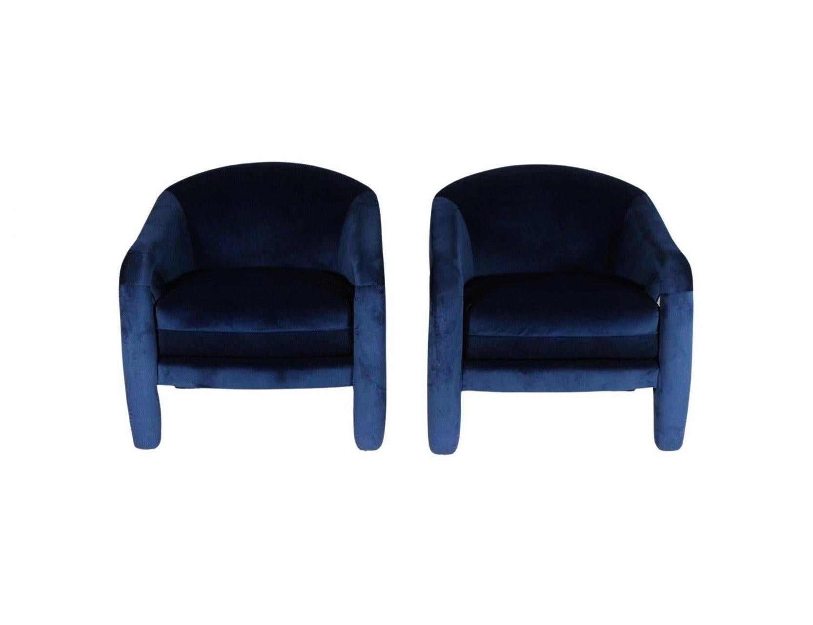 These navy-blue chairs inspired by the iconic designer Vladimir Kagan, are bold and eye-catching that will add a pop of color and visual interest to any room. Echoing modernity through their sensuous curves and swooping lines, highlighting an open