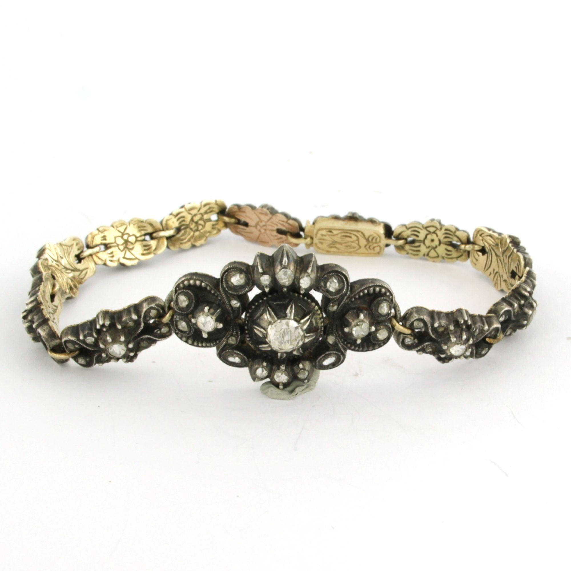 Pulsera victoriana de eslabones de oro amarillo de 14 quilates y plata engastada con diamantes talla rosa de hasta 0,50 quilates - G/H - SI - 18 cm de longitud

Descripción detallada

La pulsera mide 18 cm de largo, 2,0 cm de ancho y 6,8 mm de