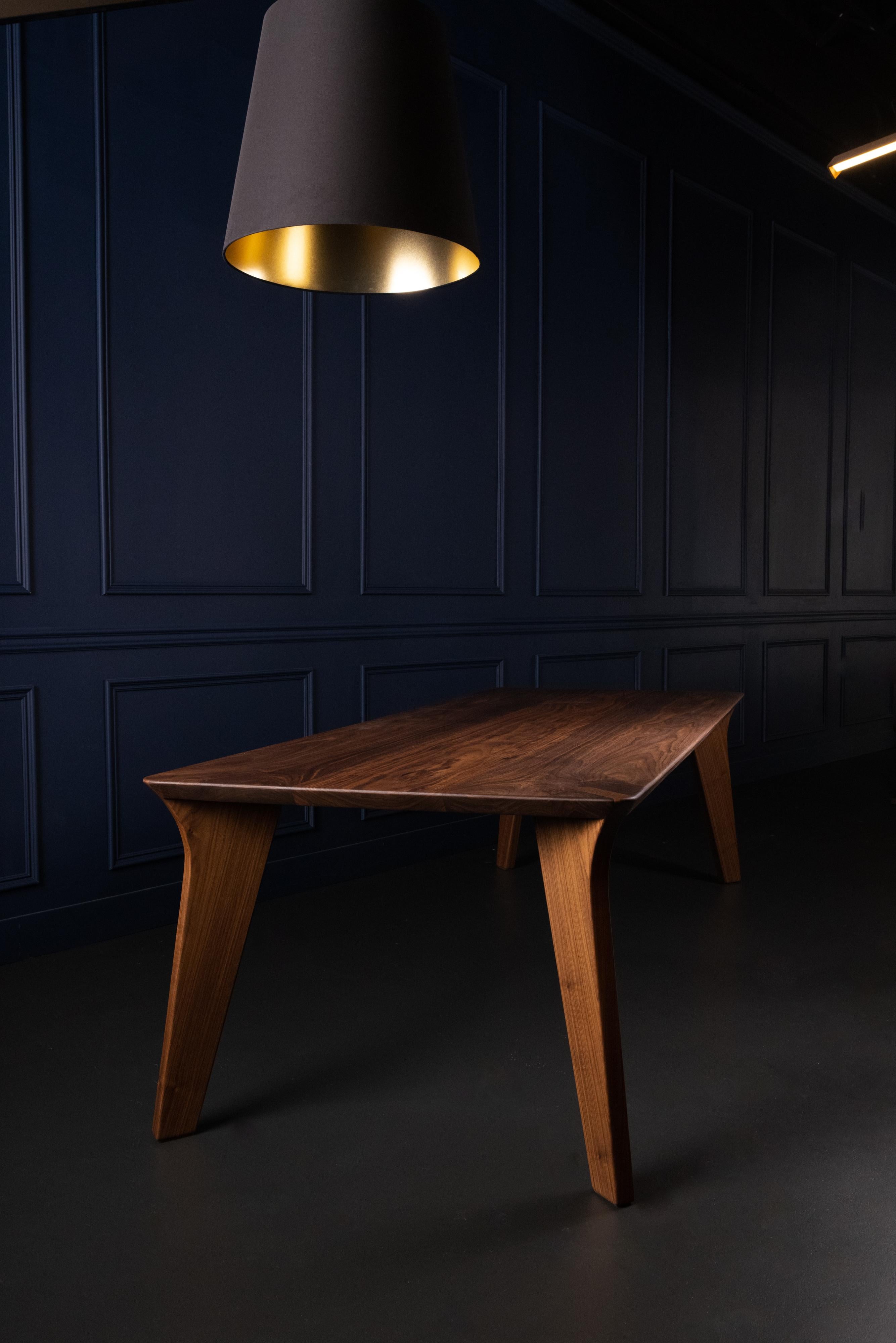 The Vöeg table in solid wood features just that....solid wood, no screws, metal or other. 

The exposed end-grain joint is both functional and aesthetically pleasing, a detail that visibly confirms its' solid wood construction. 

Made to order -