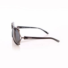 Vogue, schwarz getönte Brille.