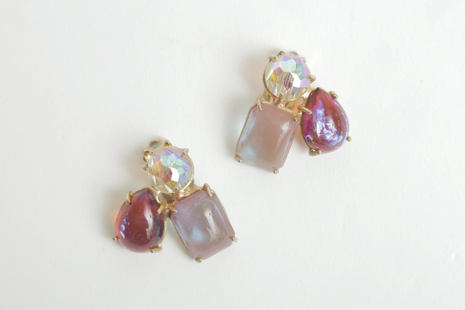 These ever so chic and gorgeous hues of the designer Vogue vintage prong set clip on earrings have the crystal Boris Aurealis. They are signed and will go with any season or wardrobe. They can go also on an angle on the ear lobe. These are from the