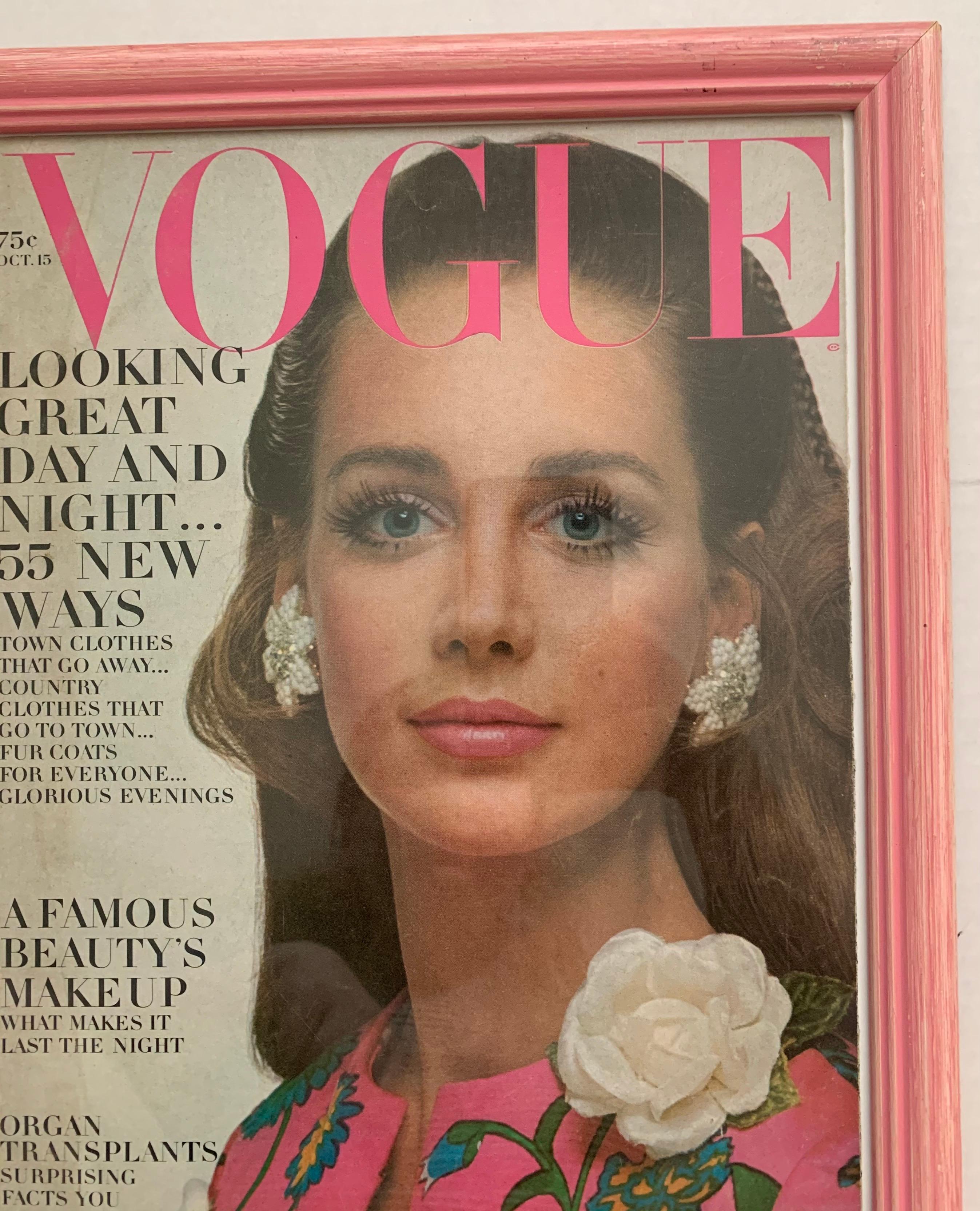 October 15, 1968 Vogue magazine framed original cover. Model Windsor Elliott photographed by Gianni Penati. 
As found framed condition in pink painted wooden frame.