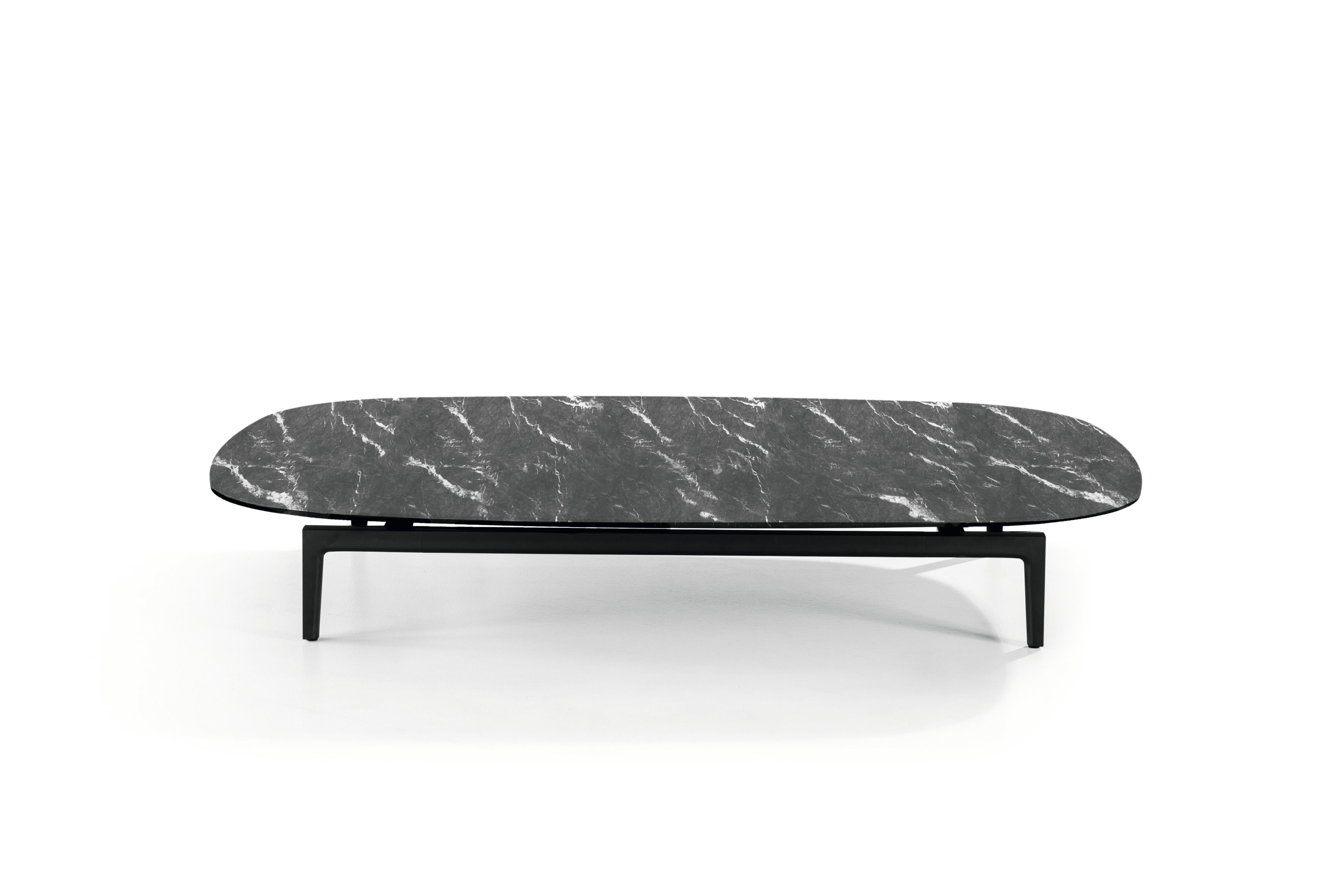 Volage Ex-S Coffee Table in Marble and Aluminium Base by Philippe Starck 

ROUNDED CONTOURS
A collection of luxurious low tables topped with premium marble, designed by Philippe Starck in two sizes, with rounded edges, each available with simple top
