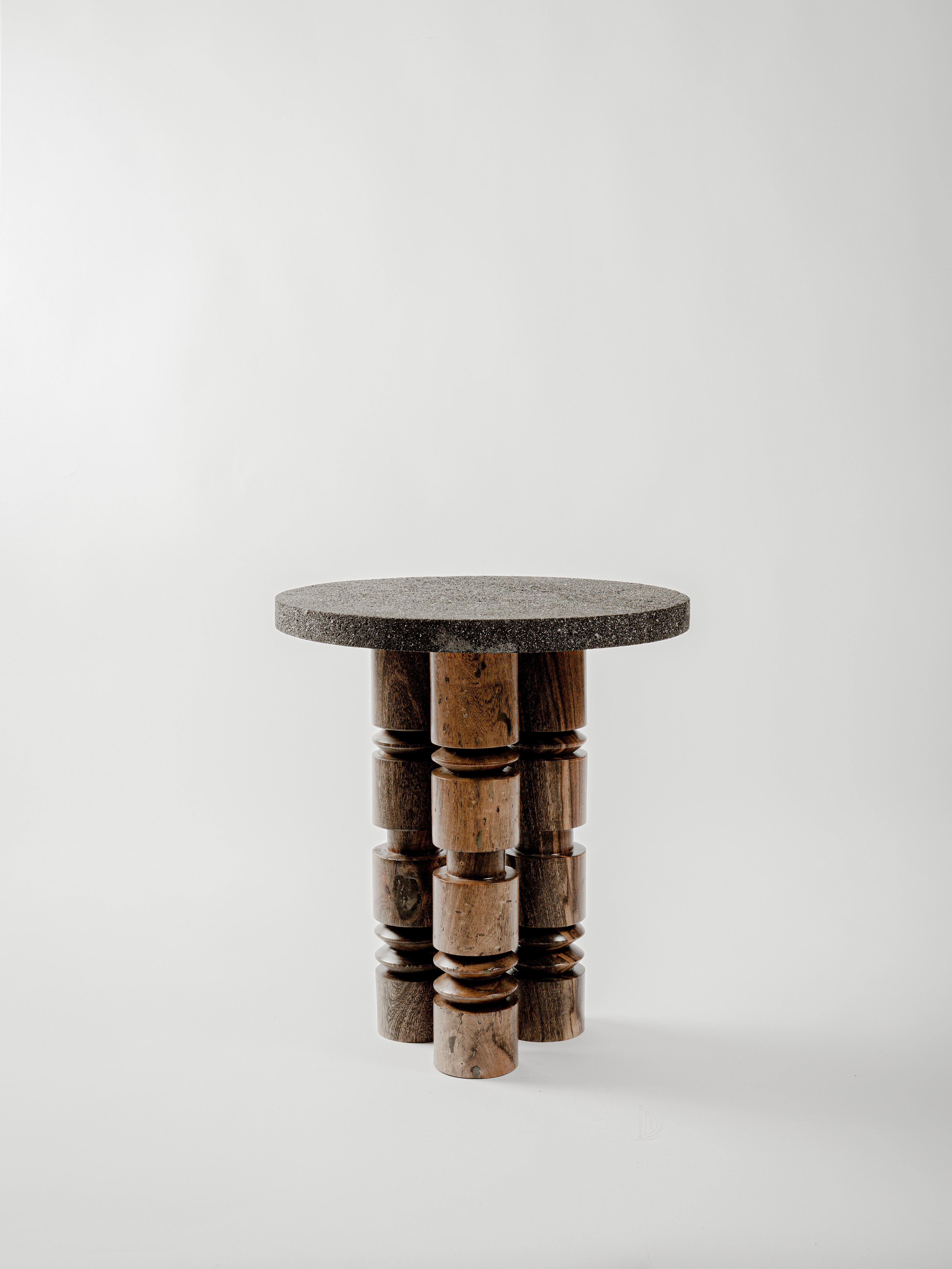Volcanic and wood Totem 01 Side Table by Daniel Orozco
Material: Solid wood, Volcanic Stone
Dimensions: D 50 x H 45 cm

Totem with volcanic stone cover and base of 3 totems of wood turned with natural finish.Handmade by Mexican artisans.

Daniel