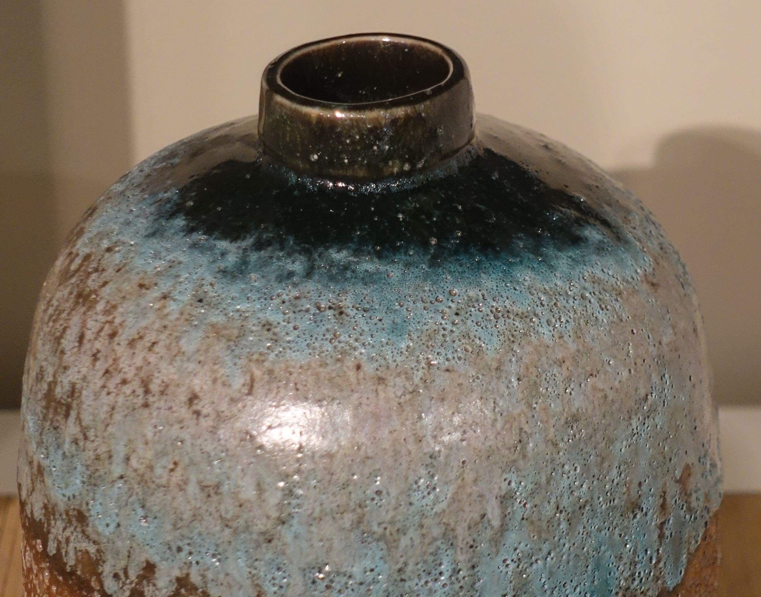 Contemporary Chinese textured volcanic glaze vase 
Sits well as part of a collection
S5141/2/3/5
