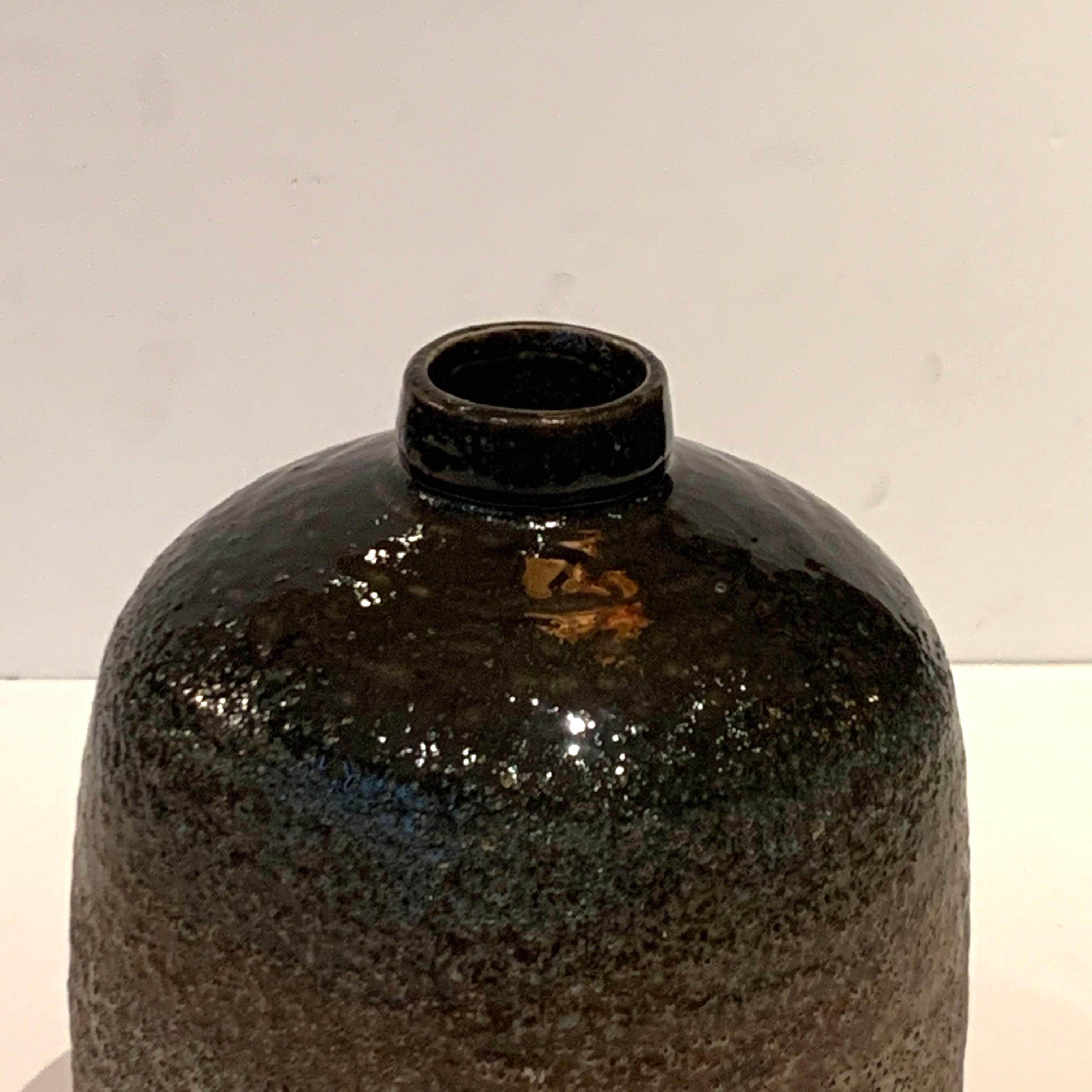 Contemporary Chinese textured volcanic glaze vase
Sits well as a set with S5143/S5144/S5145
Sold individually

  