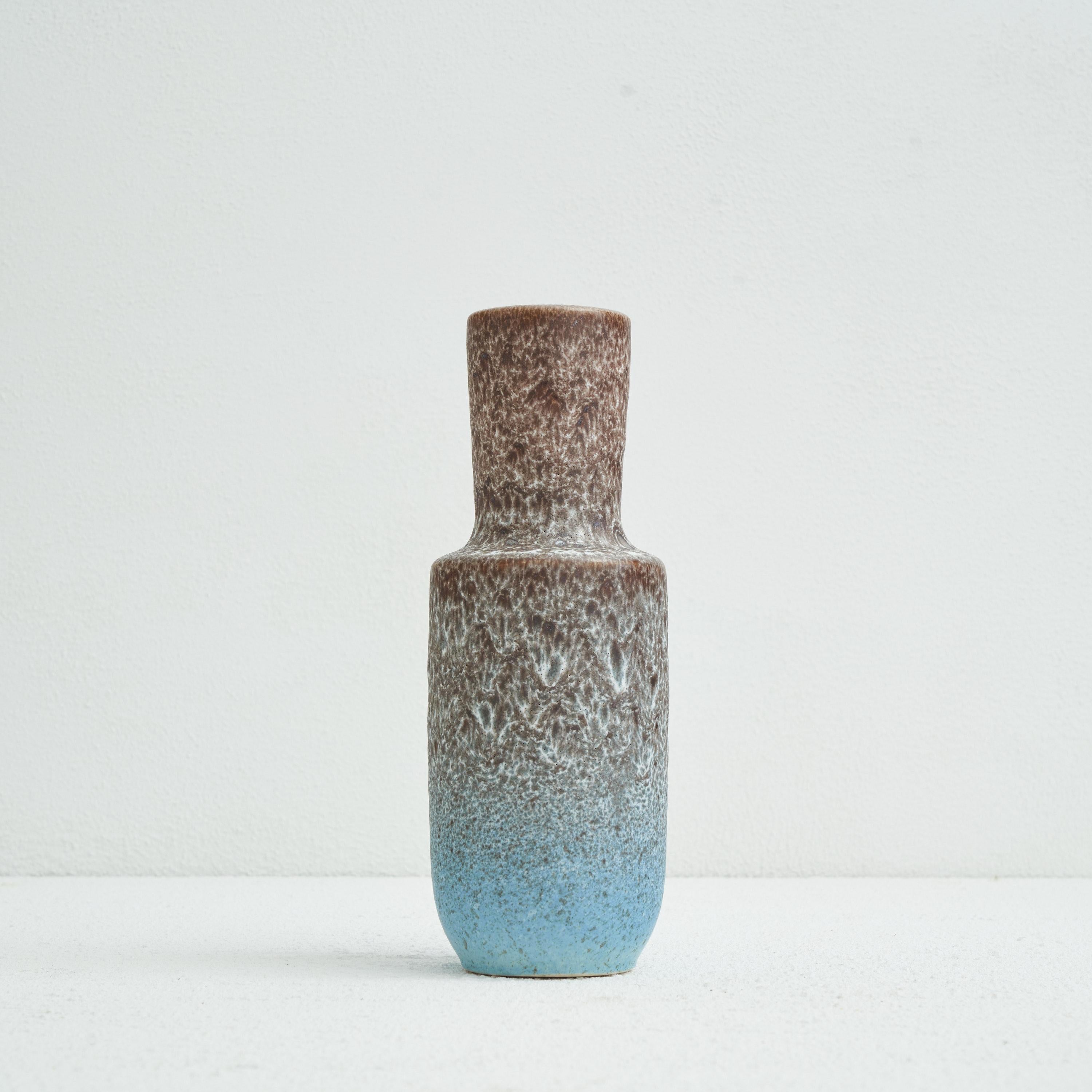 Volcanic Glazed mid century pottery vase by Steuler Keramik. Germany, mid 20th century.

Wonderful volcanic glazed mid century pottery vase by Steuler Keramik from Germany. A quintessentially mid century pottery vase from one of the famous West