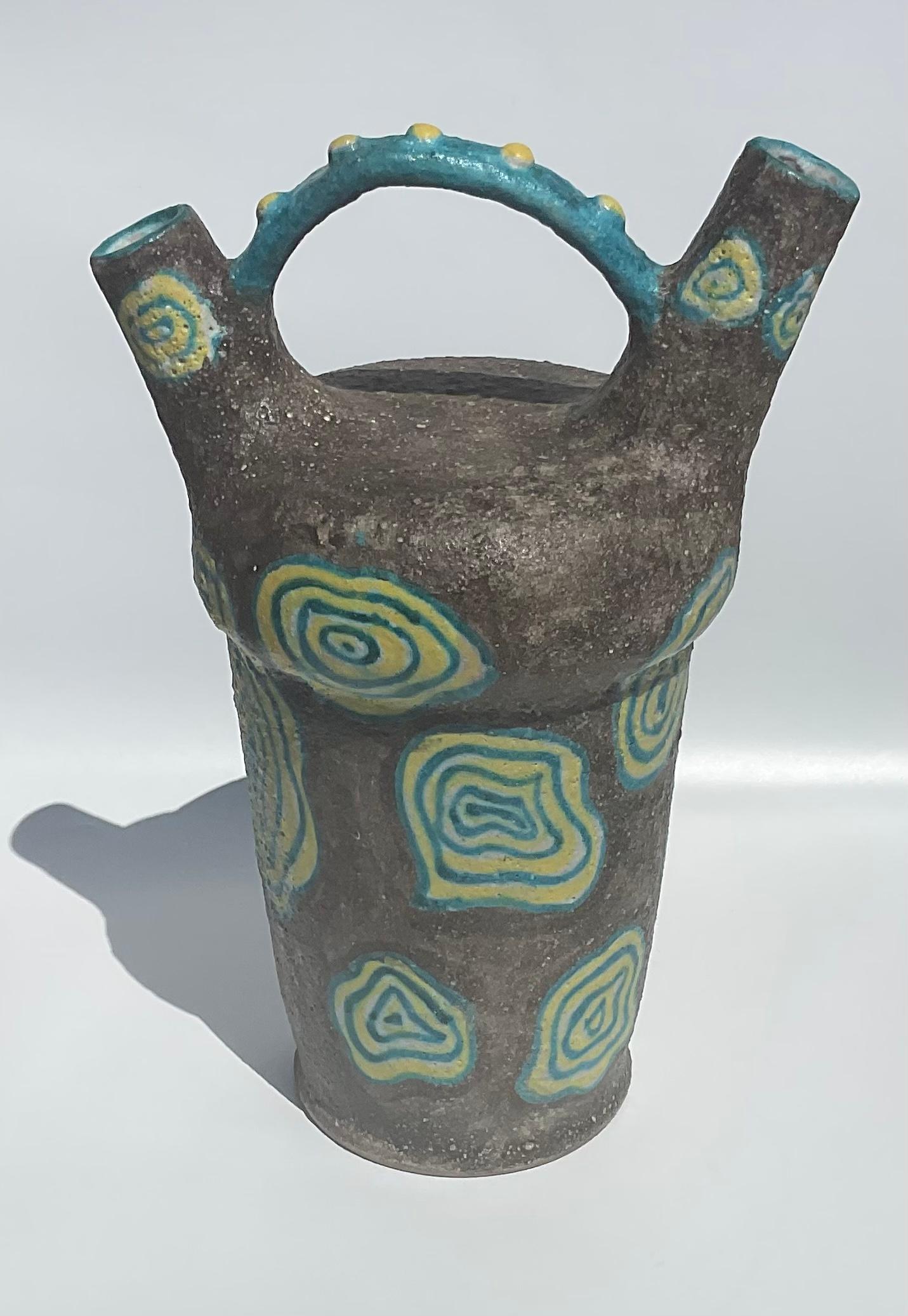 Volcanic Lava Glaze Mid-Century Modern Dual spout LARGE Italian Pottery Vase With spiral decoration. Signed by the artist as pictured. This piece fits in with all iconic designer Italian pottery pieces by Guido Gambone, and Marcello Fantoni, in