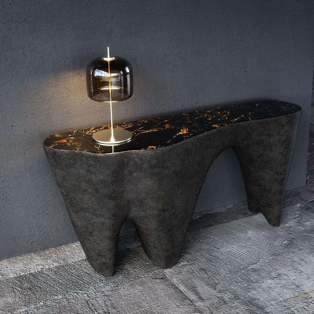 A stunning masterpiece that grabs attention in any room. Inspired by the raw and rugged beauty of volcanic textures, this console has a unique and rough finish, bringing an organic charm to its design. The flowing shapes and dynamic lines give a