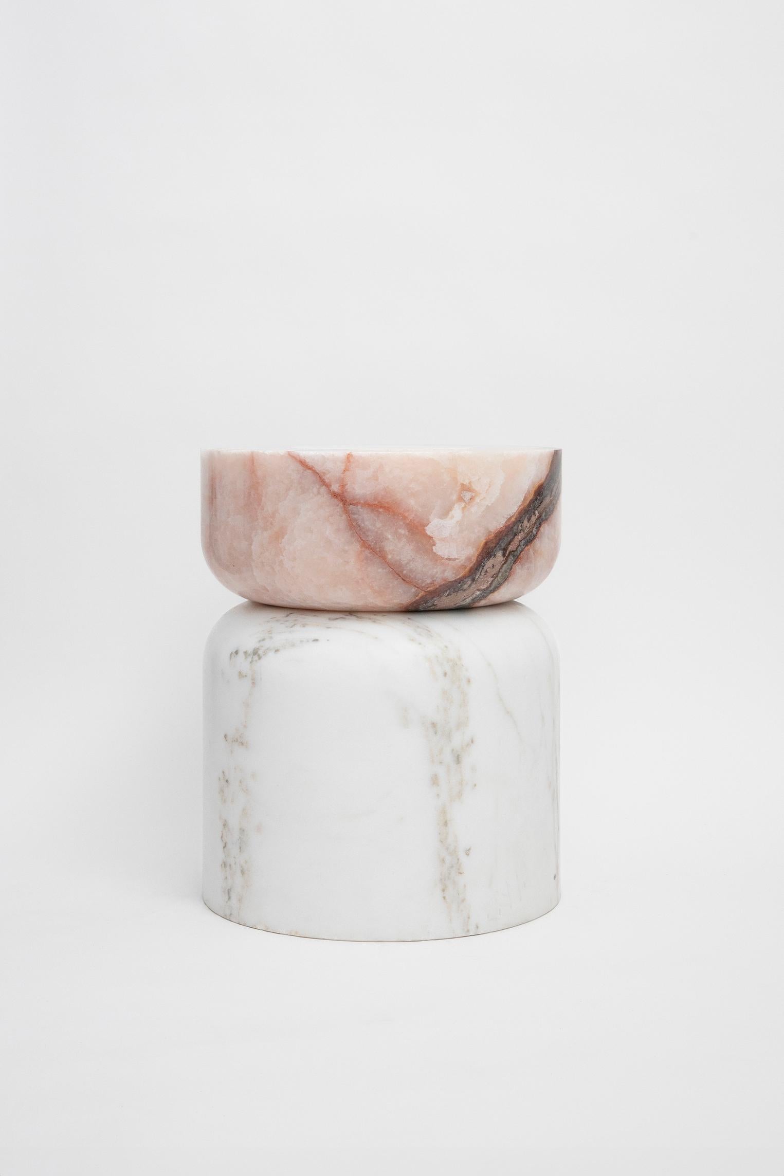 Volcanic Shade of Marble IV

Golden calacatta marble, pink onyx.
Pineapple onyx marble
13.7 x 13.7 x 17.1 in

Serving as a visual metaphor for volcanoes that, through their craters, open faultlines into the Earth’s core, they are made from