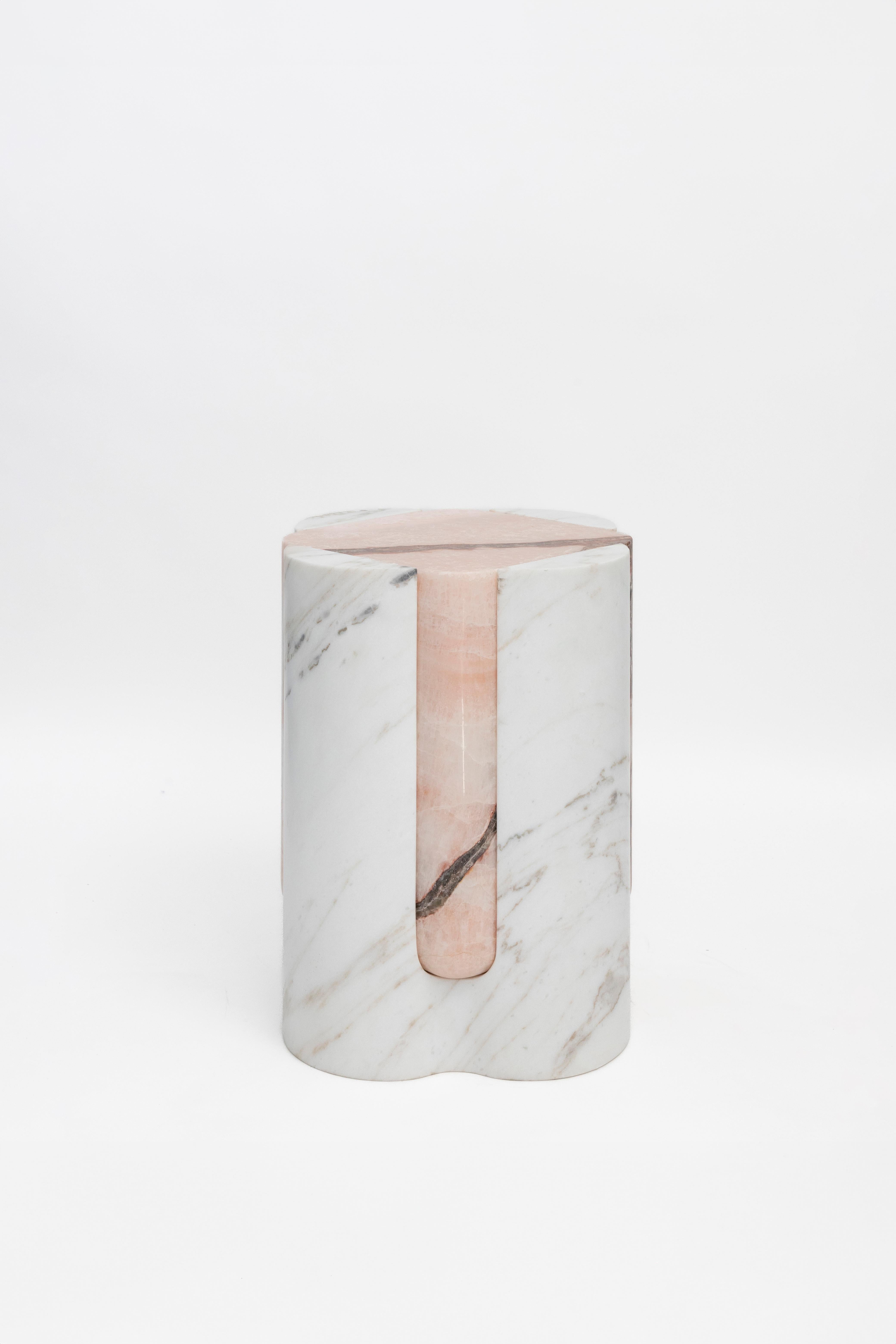 Materials:Golden Calacatta marble and pink onyx

While, in principle, marble bears not a volcanic origin, the veiny, fine-grained Yule marble employed for this variation of Sten Studio’s distinctive stools is quarried from the profound interior of