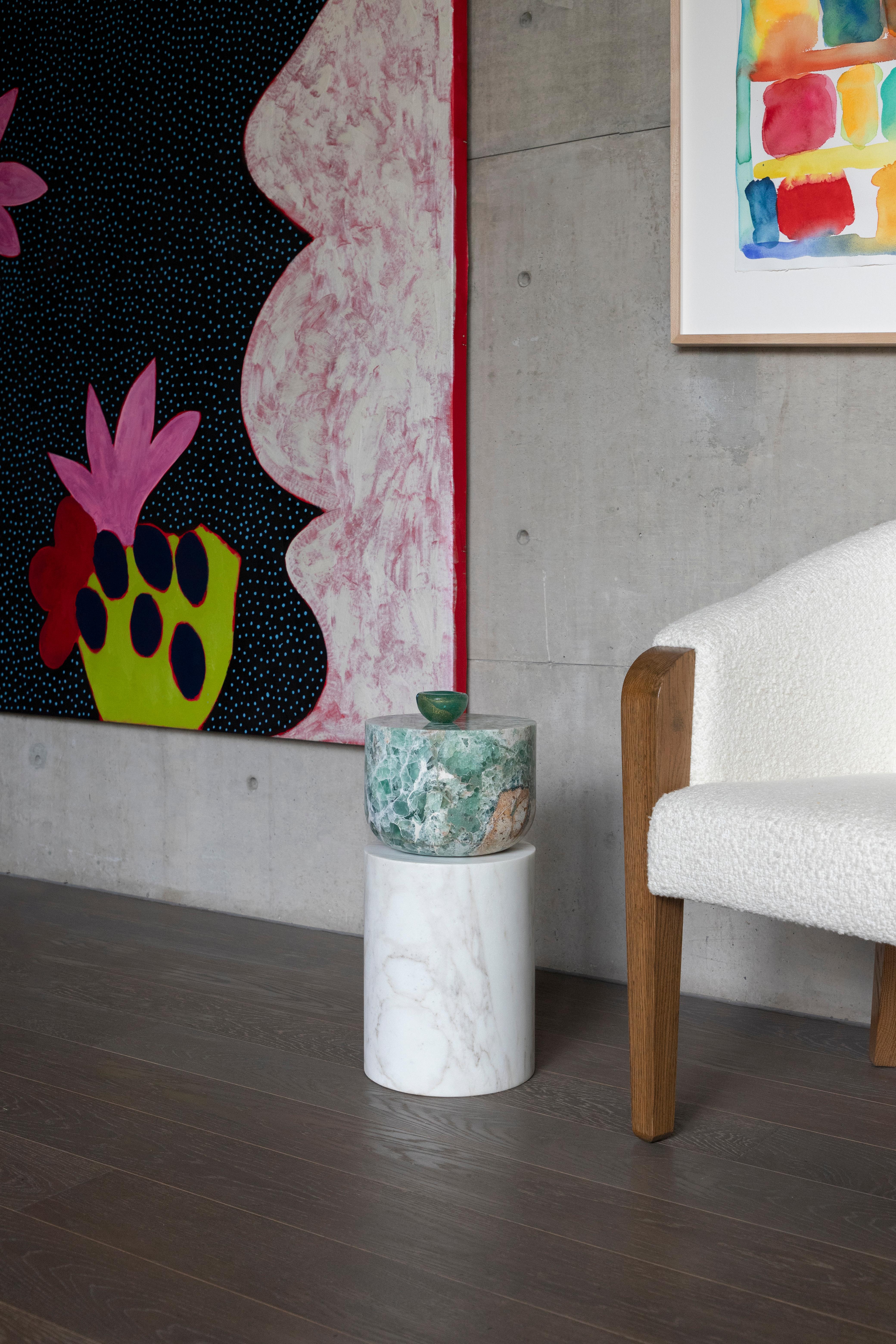 Materials: Golden Calacatta marble and fluorite
Indoors and outdoors
Side table / Stool

While, in principle, marble bears not a volcanic origin, the veiny, fine-grained Yule marble employed for this variation of Sten Studio’s distinctive stools is