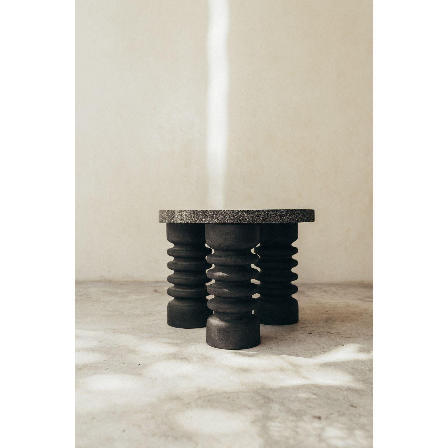 Volcanic stone and burnt wood table by Daniel Orozco
Dimensions: D 45 x H 34 cm
Materials: Wood, Volcanic Stone

Daniel Orozco Estudio
We are an inclusive interior design estudio, who love to work with fabrics and natural textiles in makes our