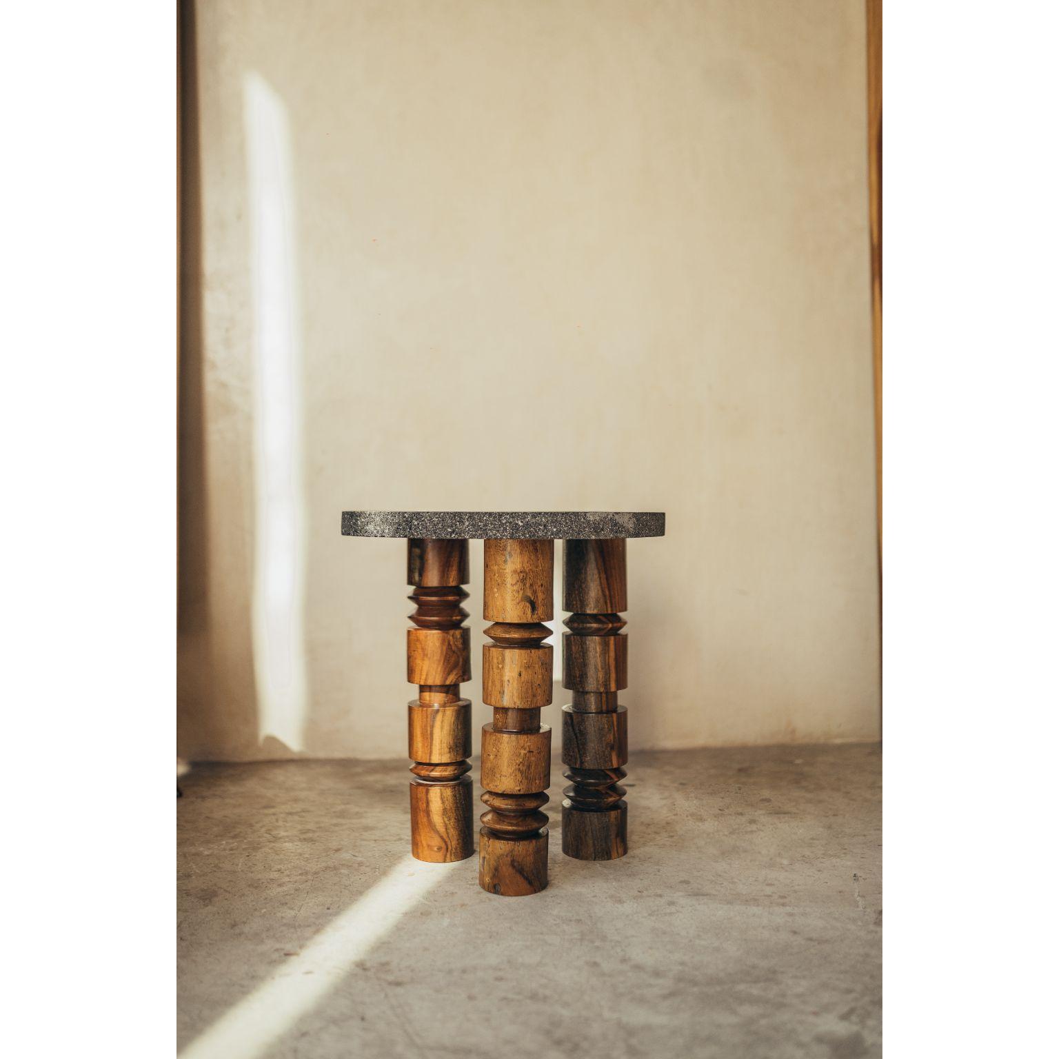 Volcanic stone table with turned wooden legs by Daniel Orozco
Dimensions: D 50 x H 45 cm
Materials: Wood, Volcanic Stone

Daniel Orozco Estudio
We are an inclusive interior design estudio, who love to work with fabrics and natural textiles in