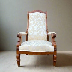 Voltaire armchair  France around 1850  Walnut and white fabric upholstery